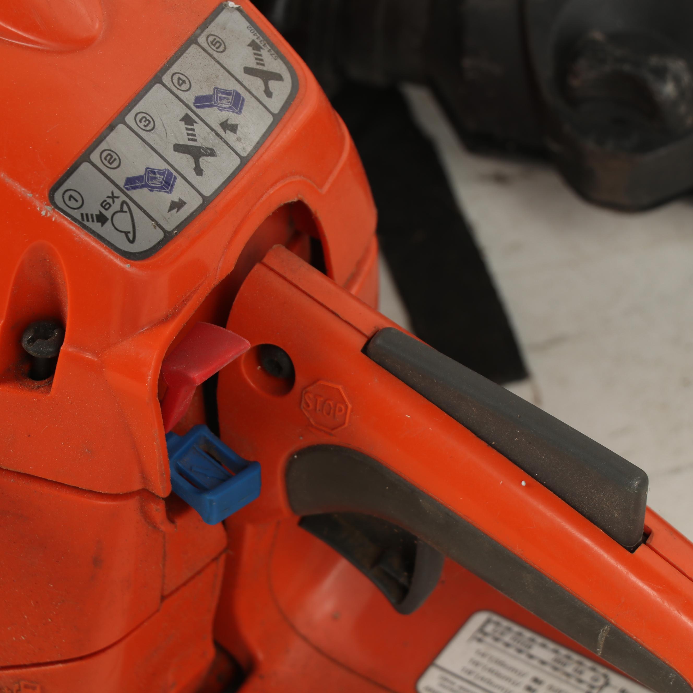 True Temper Wheel Barrow with Chainsaw and Leaf Blower