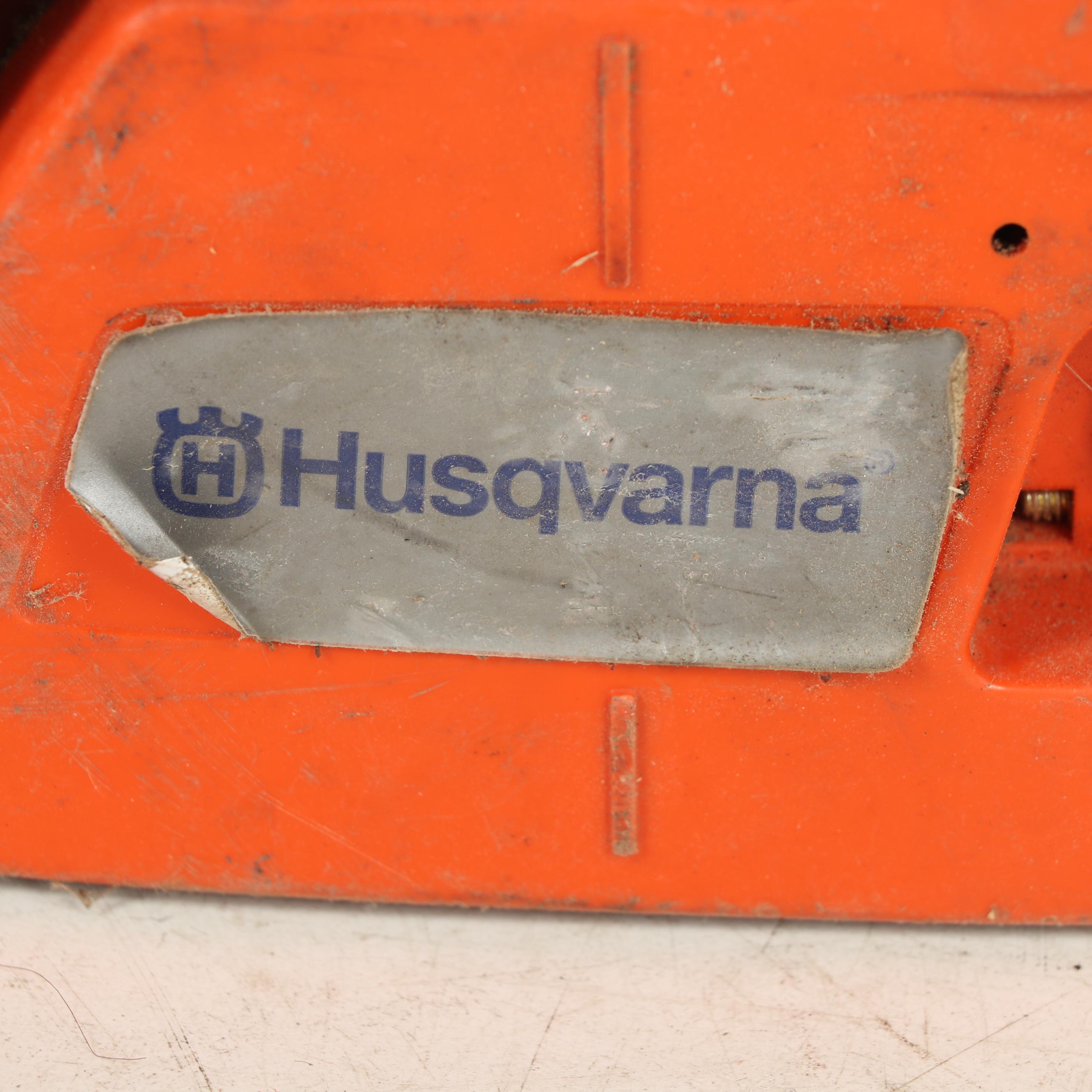 True Temper Wheel Barrow with Chainsaw and Leaf Blower