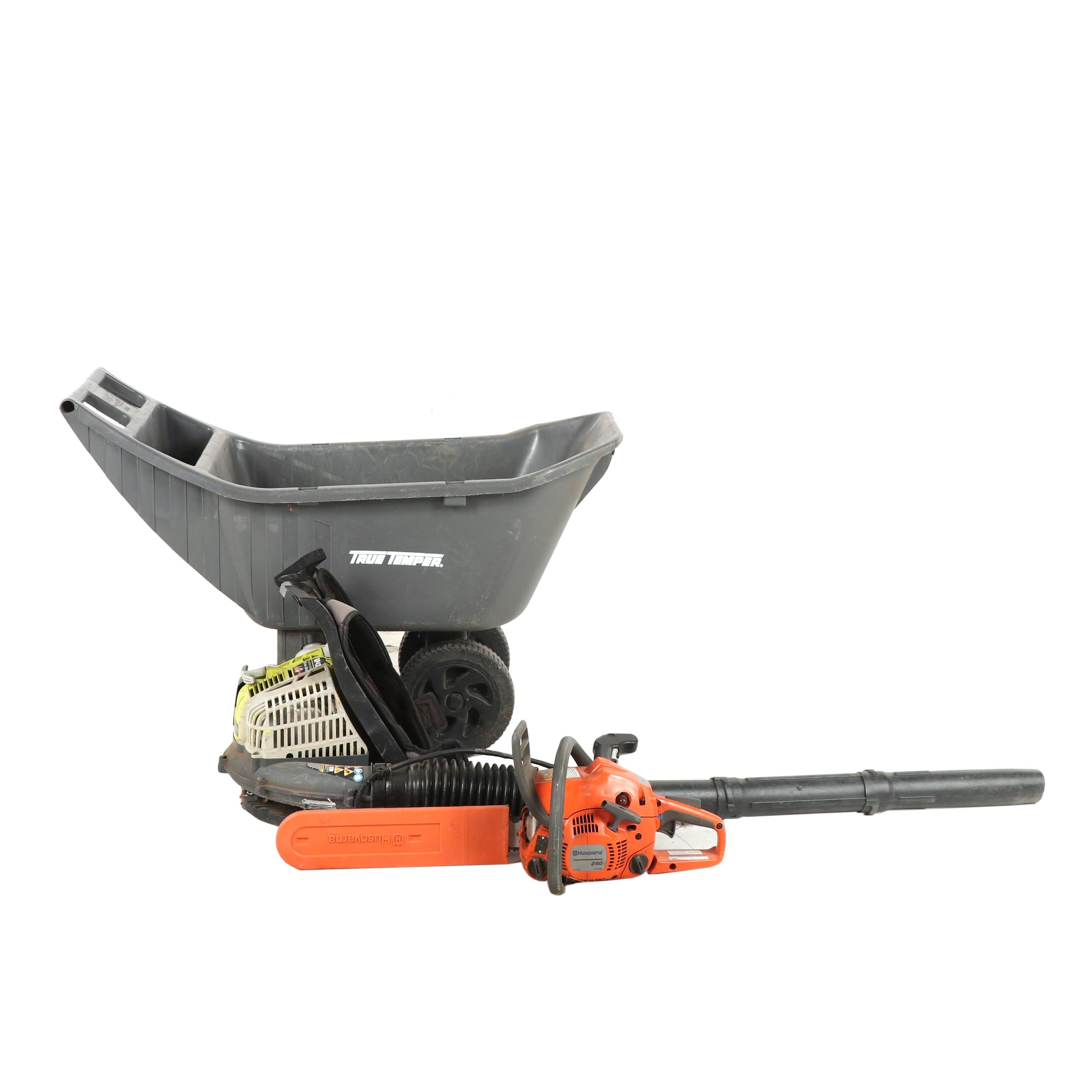 True Temper Wheel Barrow with Chainsaw and Leaf Blower