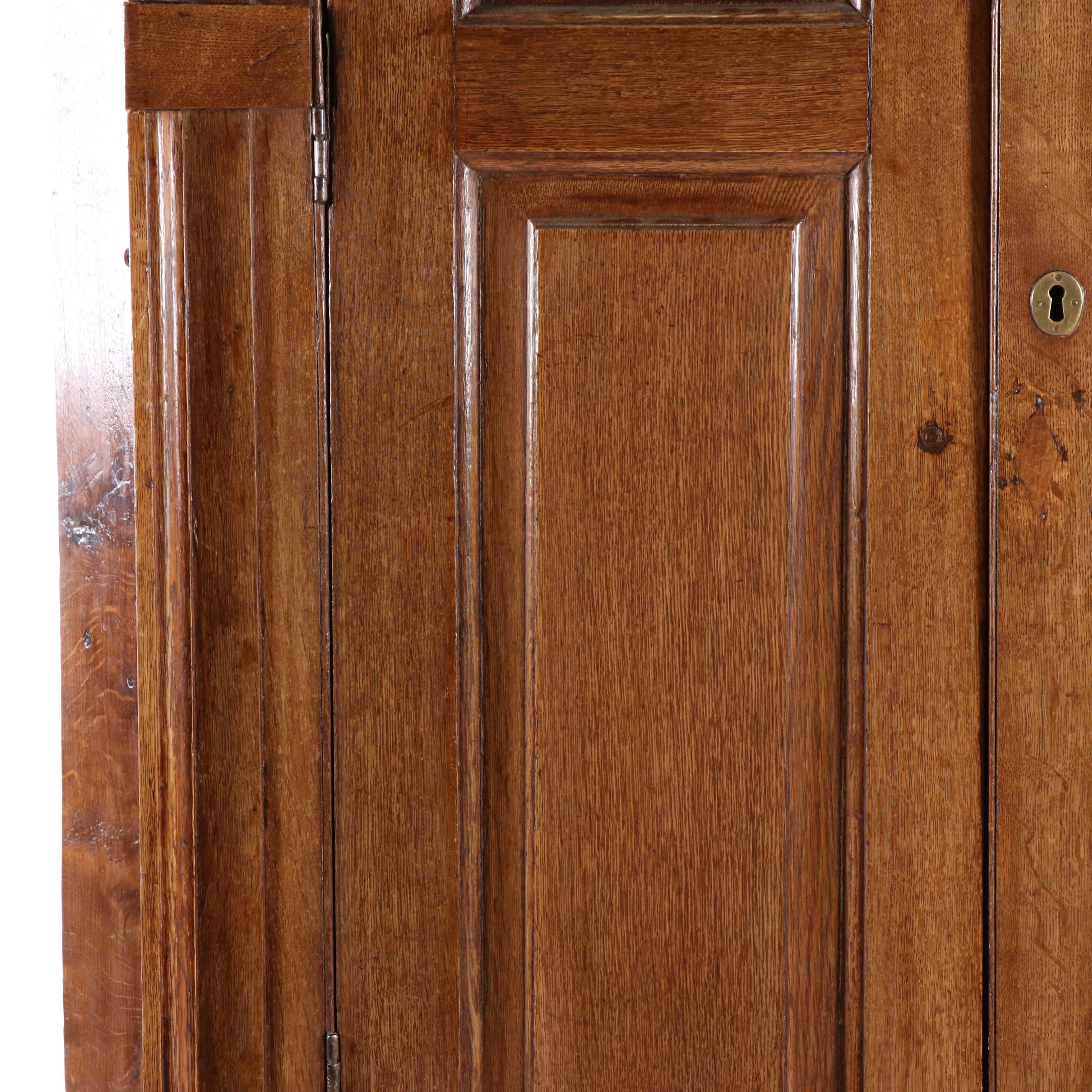 George III Provincial Oak Corner Cupboard with Architectural Interior, 19th C.