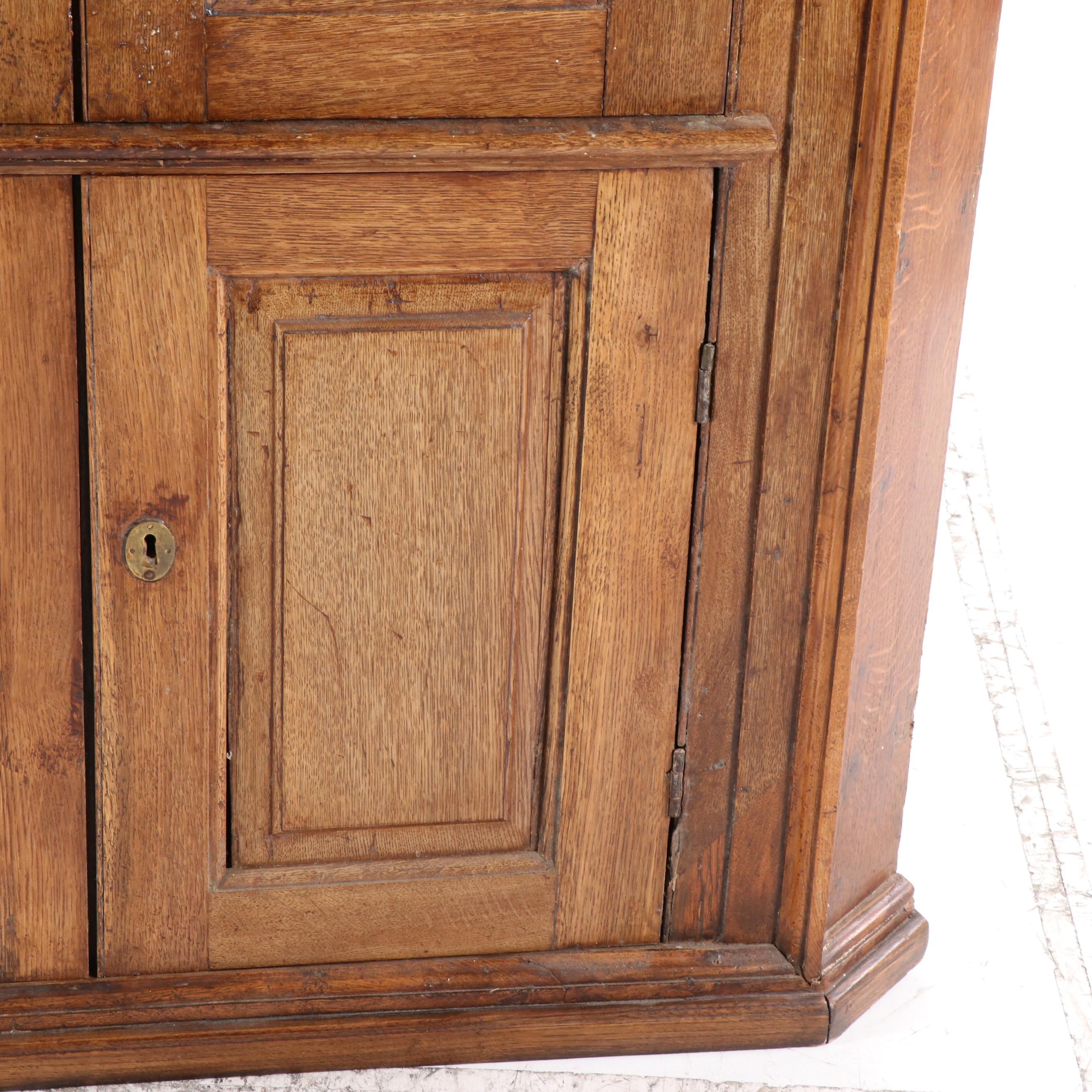 George III Provincial Oak Corner Cupboard with Architectural Interior, 19th C.