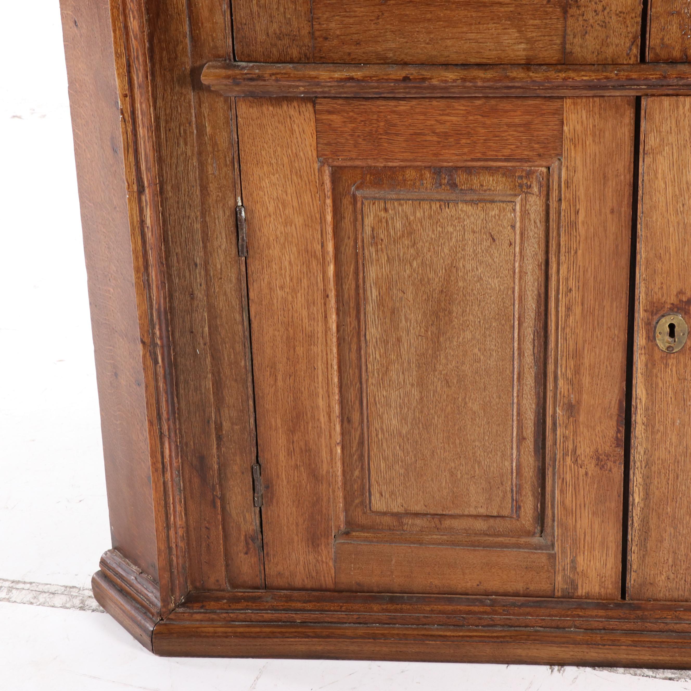 George III Provincial Oak Corner Cupboard with Architectural Interior, 19th C.