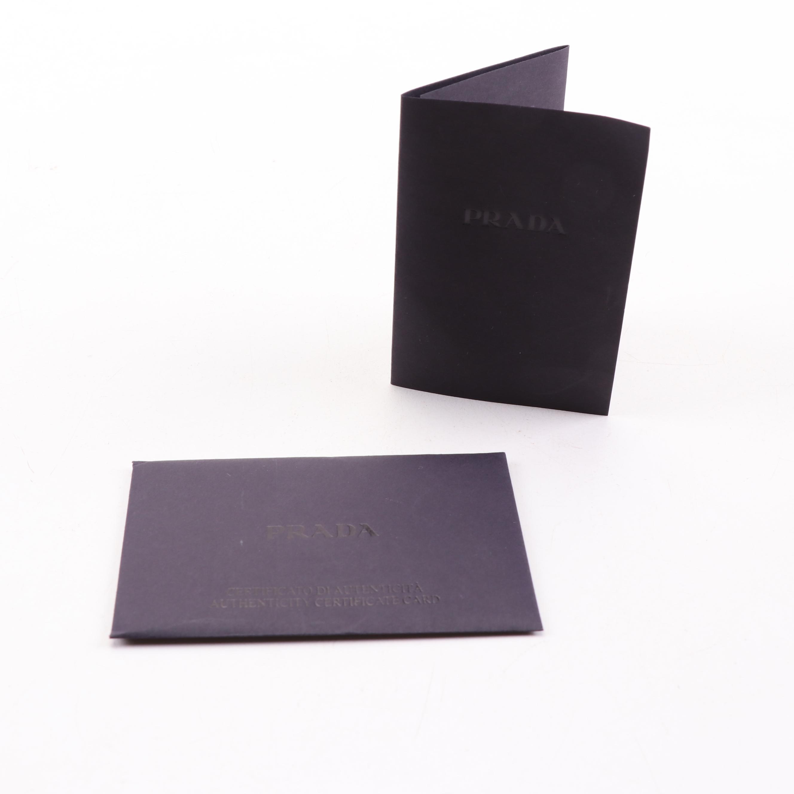 Prada Handbag in Black and Off-White Patent Leather