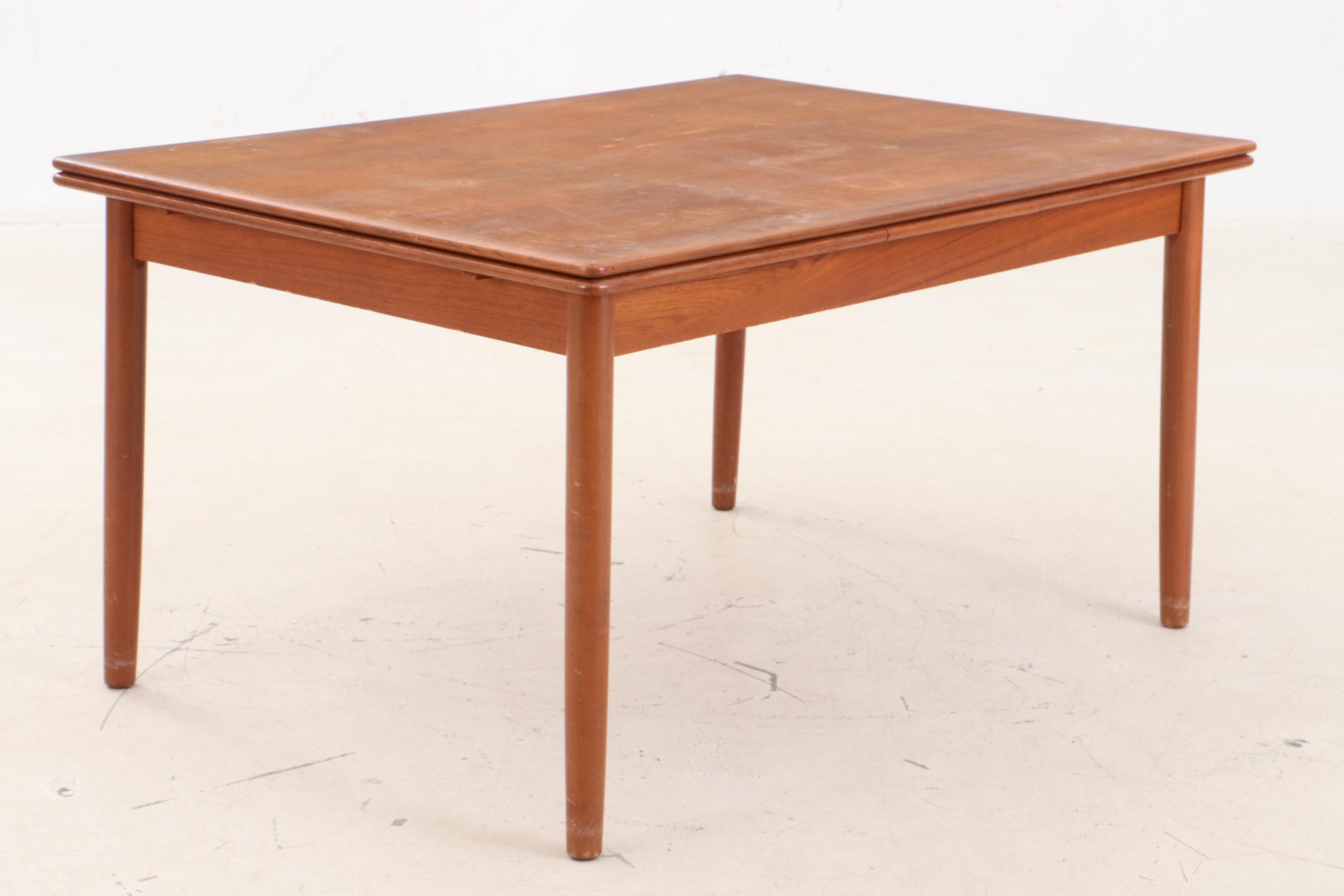 Danish Modern Teak Draw Leaf Dining Table and Chairs