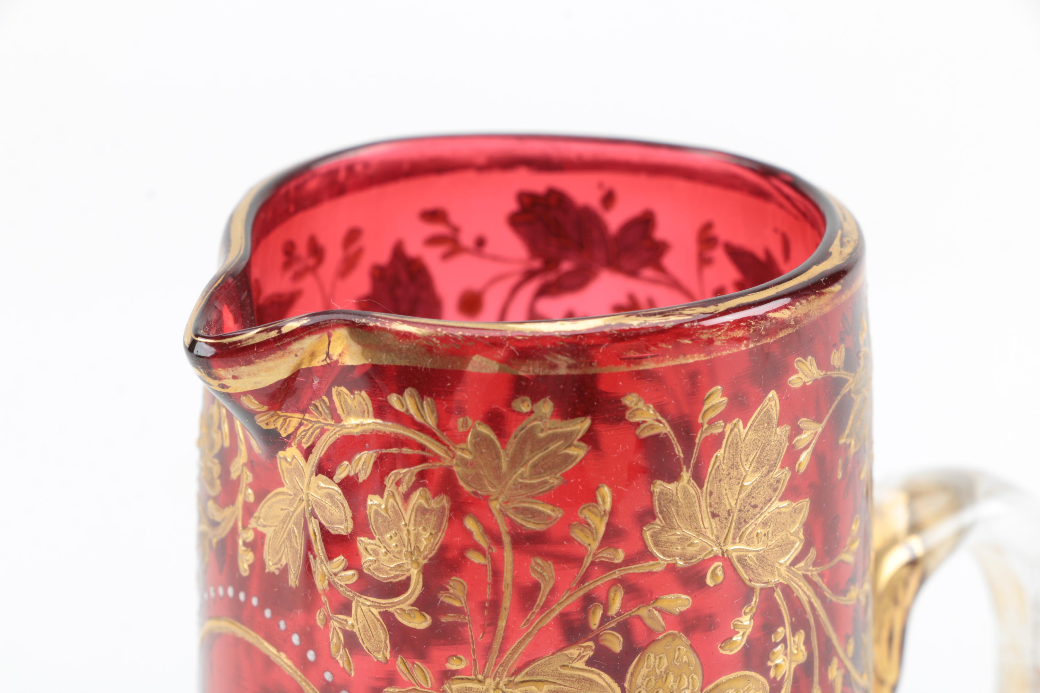 Mary Gregory Style Gilt Enameled Cranberry Glass Pitcher, Late 19th/Early 20th C