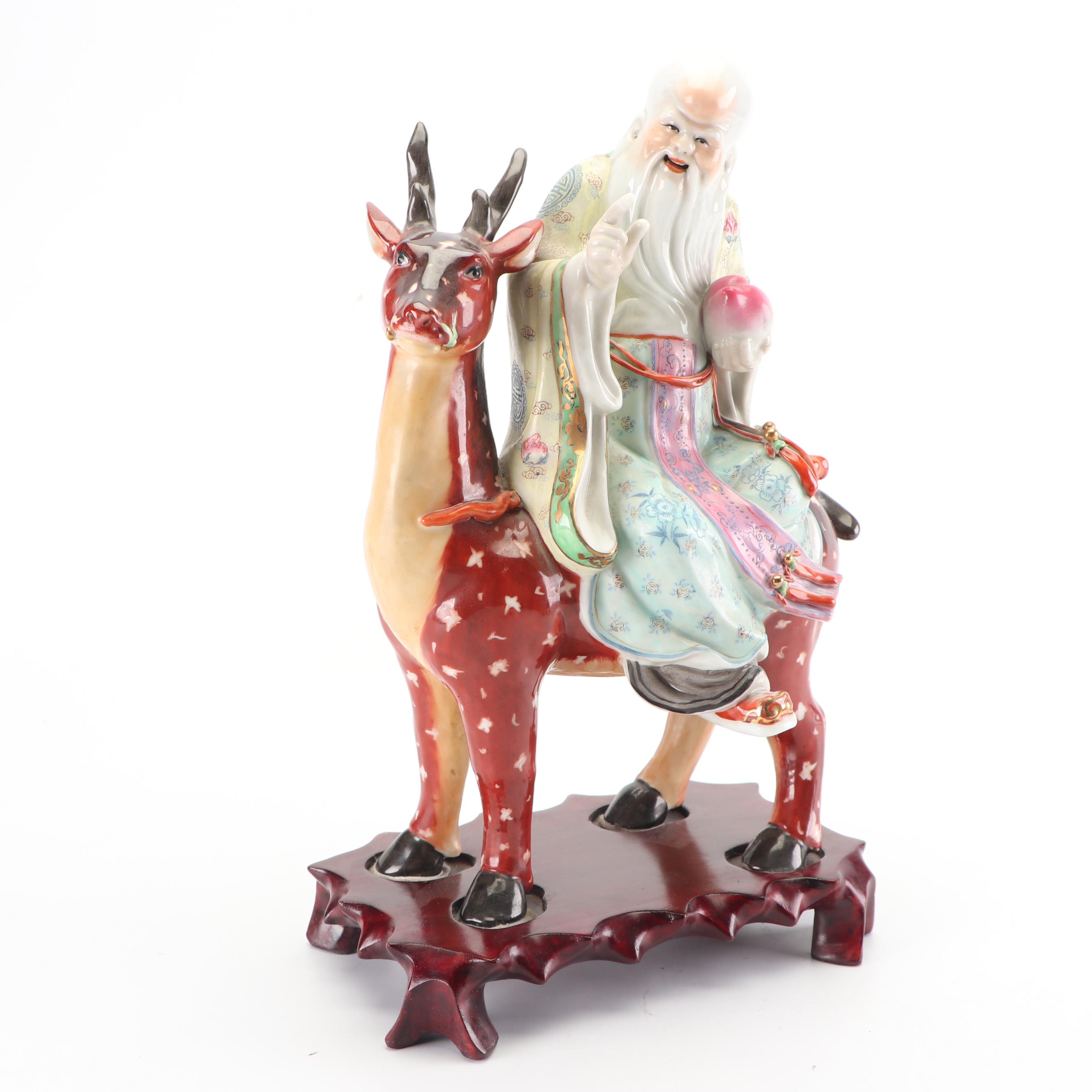 Chinese God of Longevity Riding a Deer Ceramic Figurine on Wooden Base
