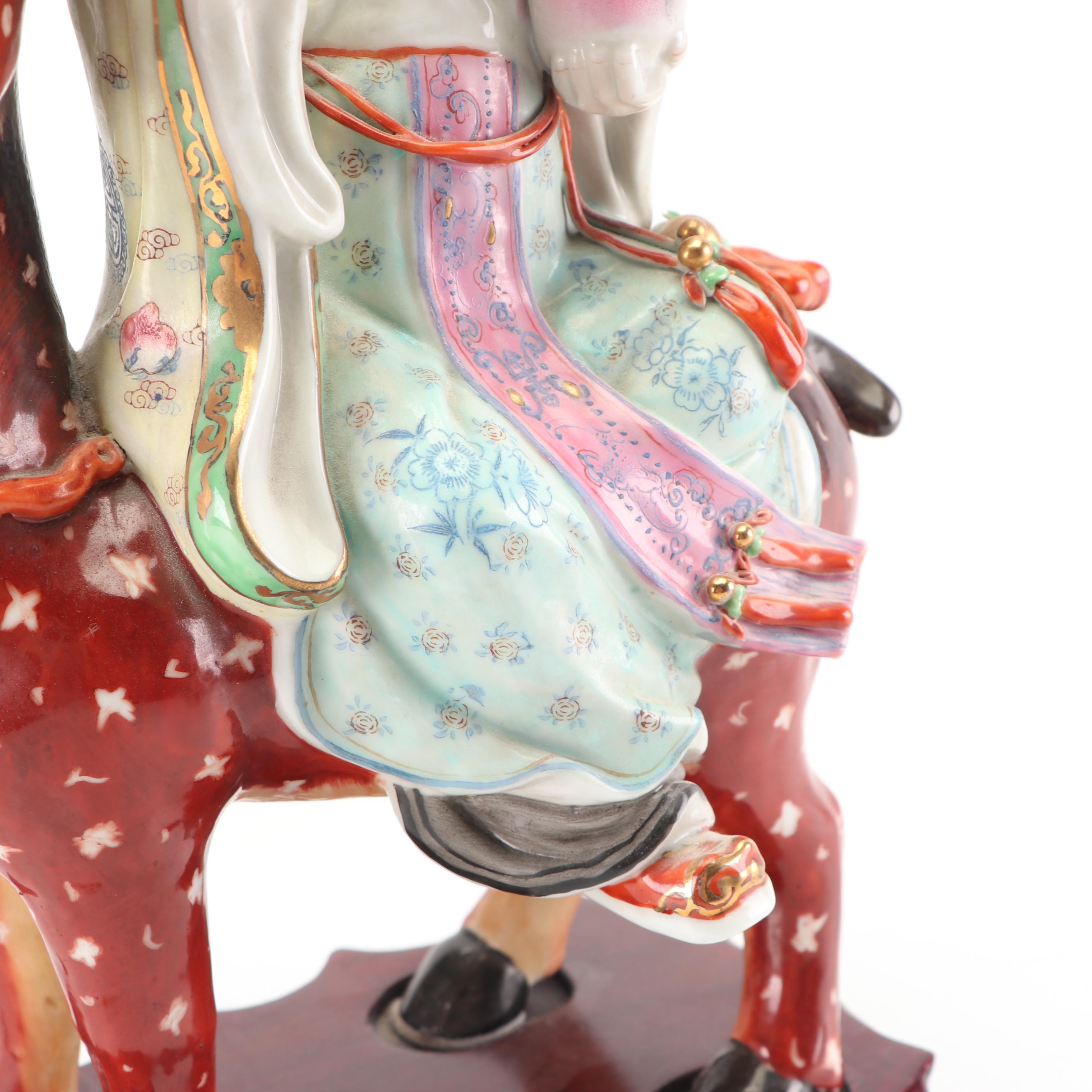 Chinese God of Longevity Riding a Deer Ceramic Figurine on Wooden Base