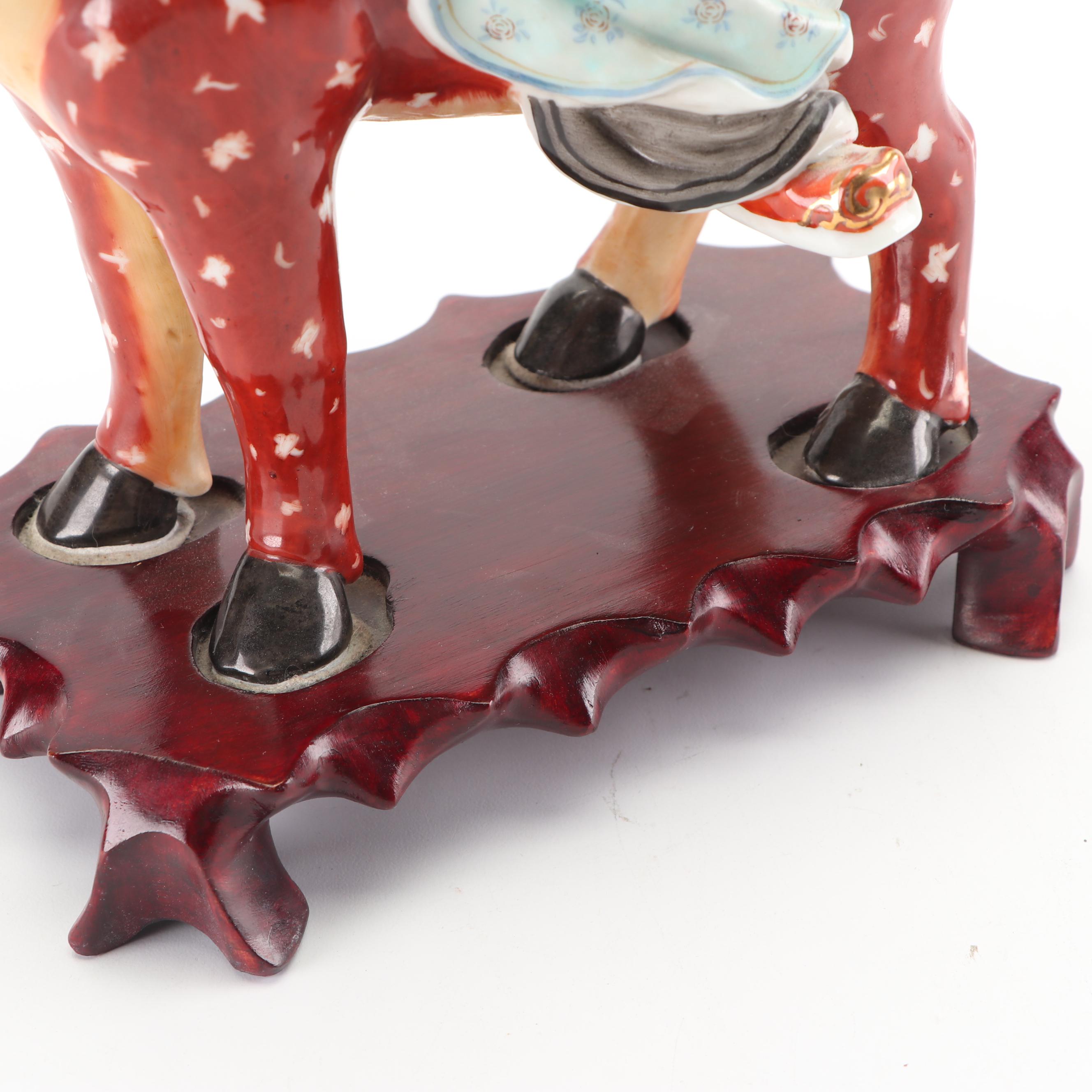 Chinese God of Longevity Riding a Deer Ceramic Figurine on Wooden Base