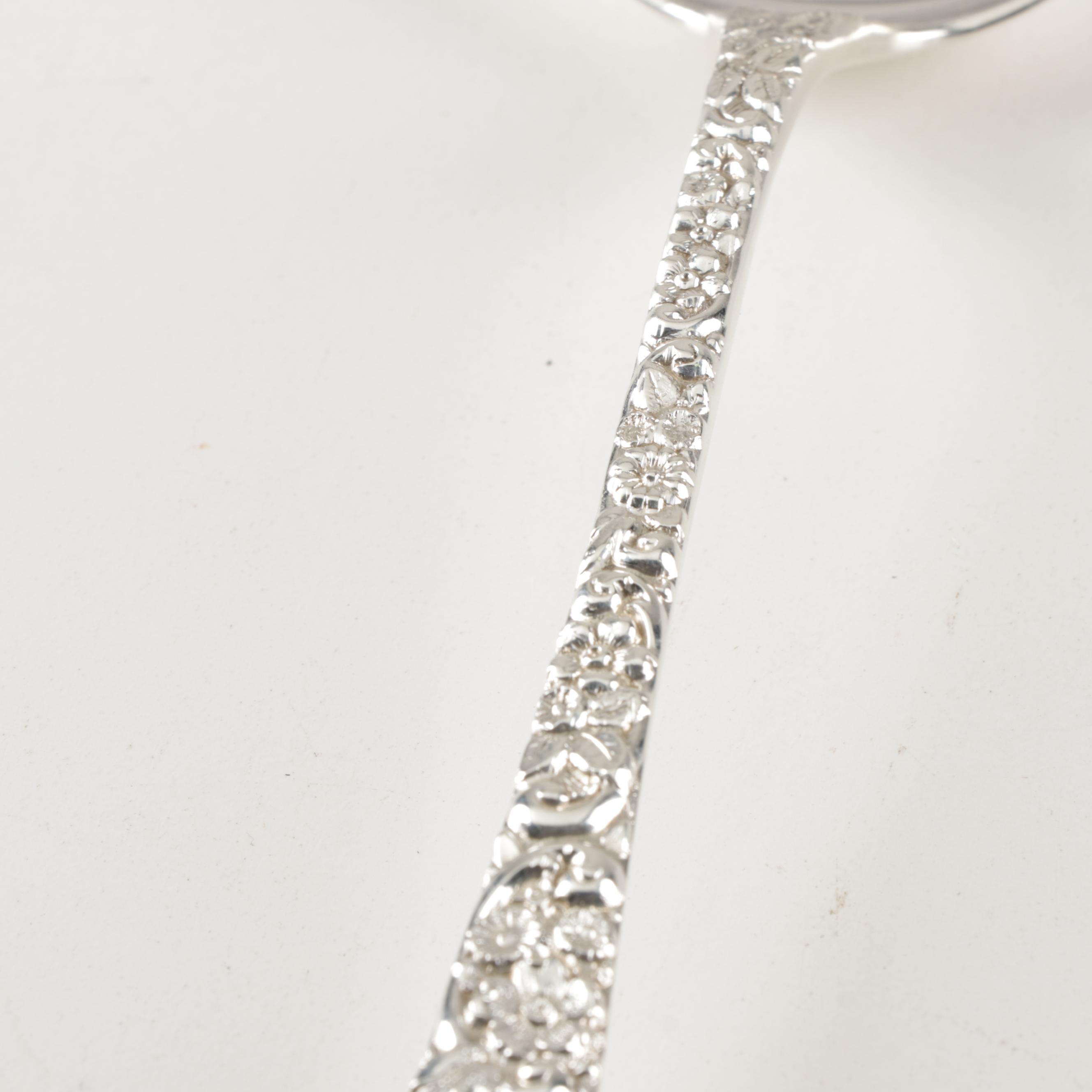 Jenkins & Jenkins "Repousse" Sterling Silver Dressing Spoon, Circa 1910