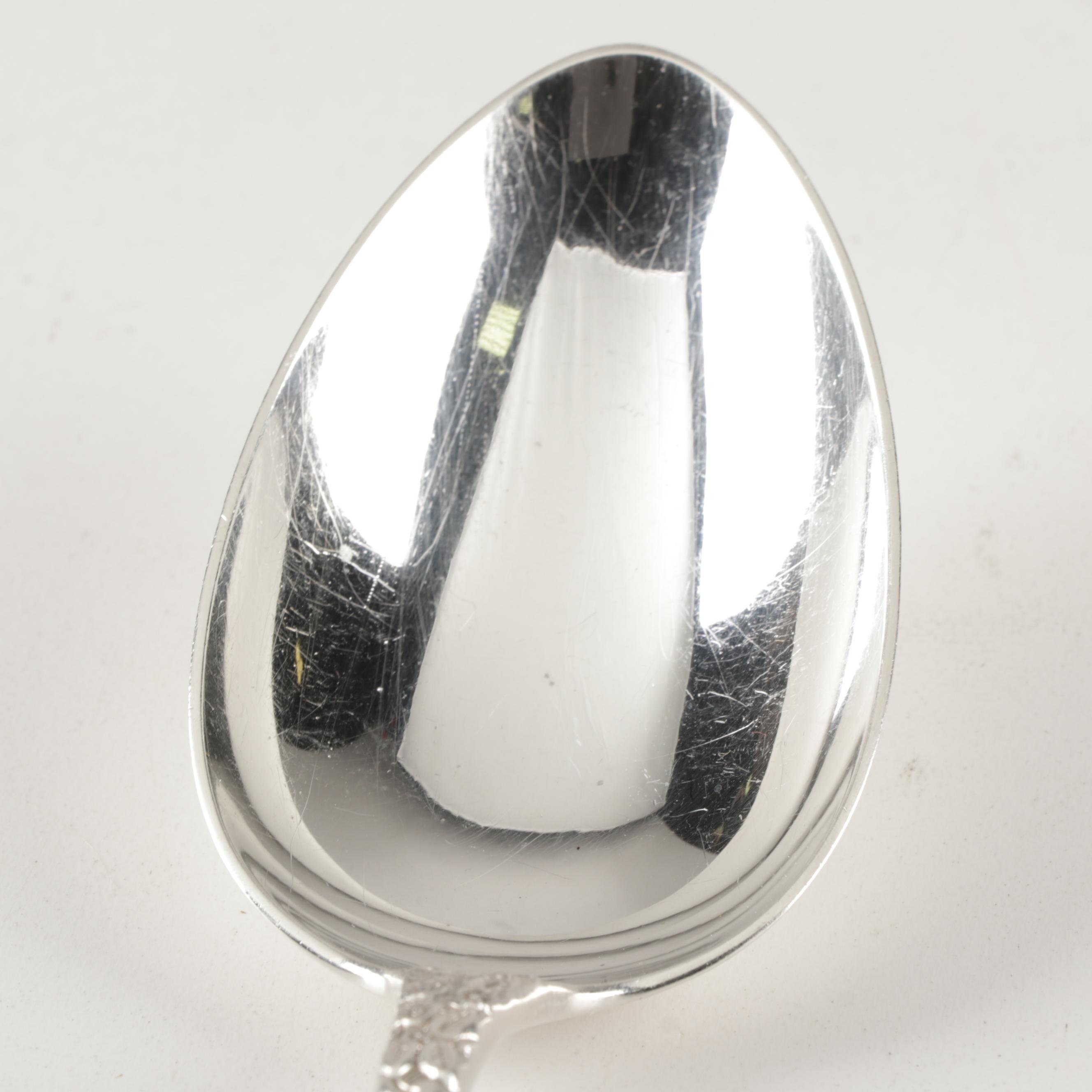 Jenkins & Jenkins "Repousse" Sterling Silver Dressing Spoon, Circa 1910