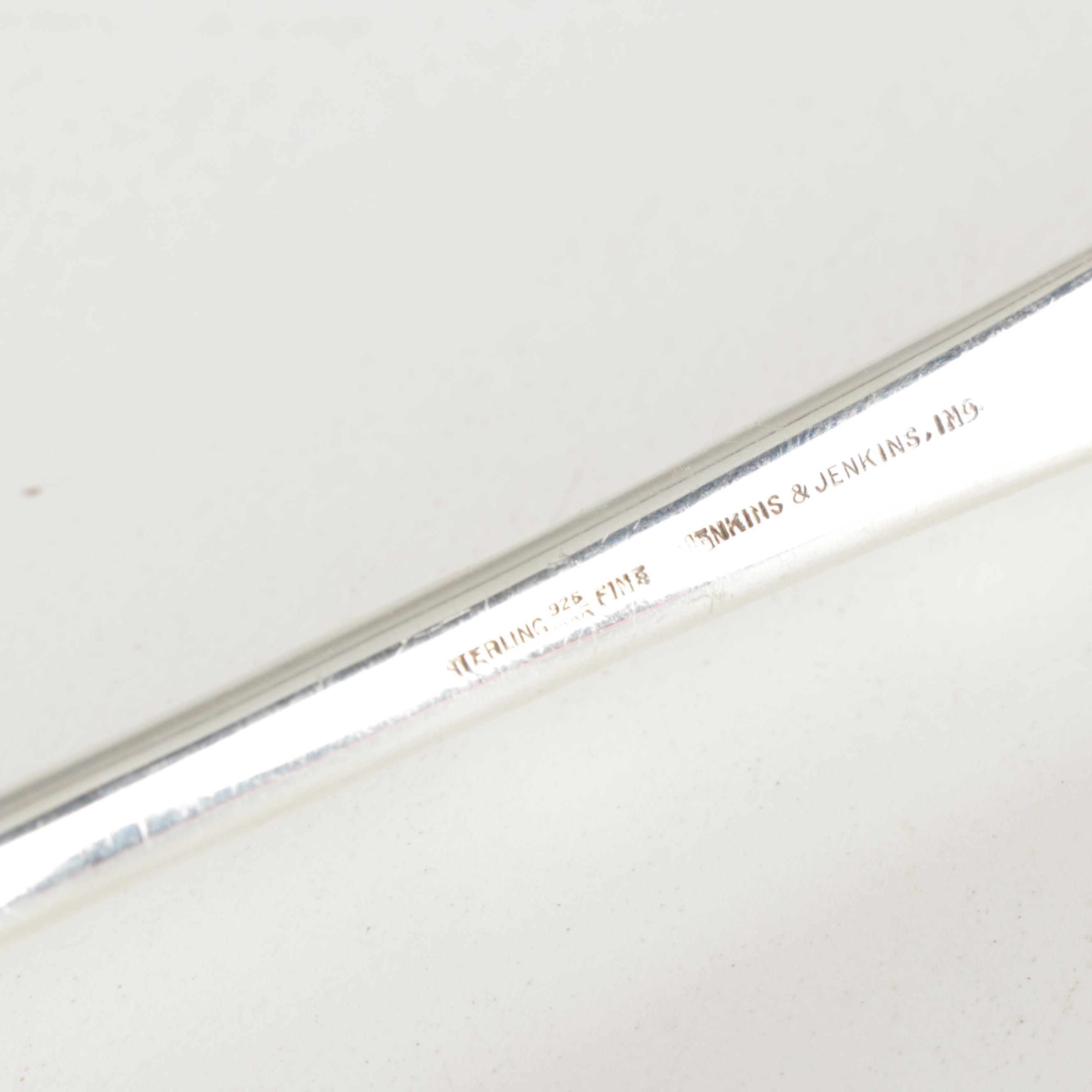 Jenkins & Jenkins "Repousse" Sterling Silver Dressing Spoon, Circa 1910