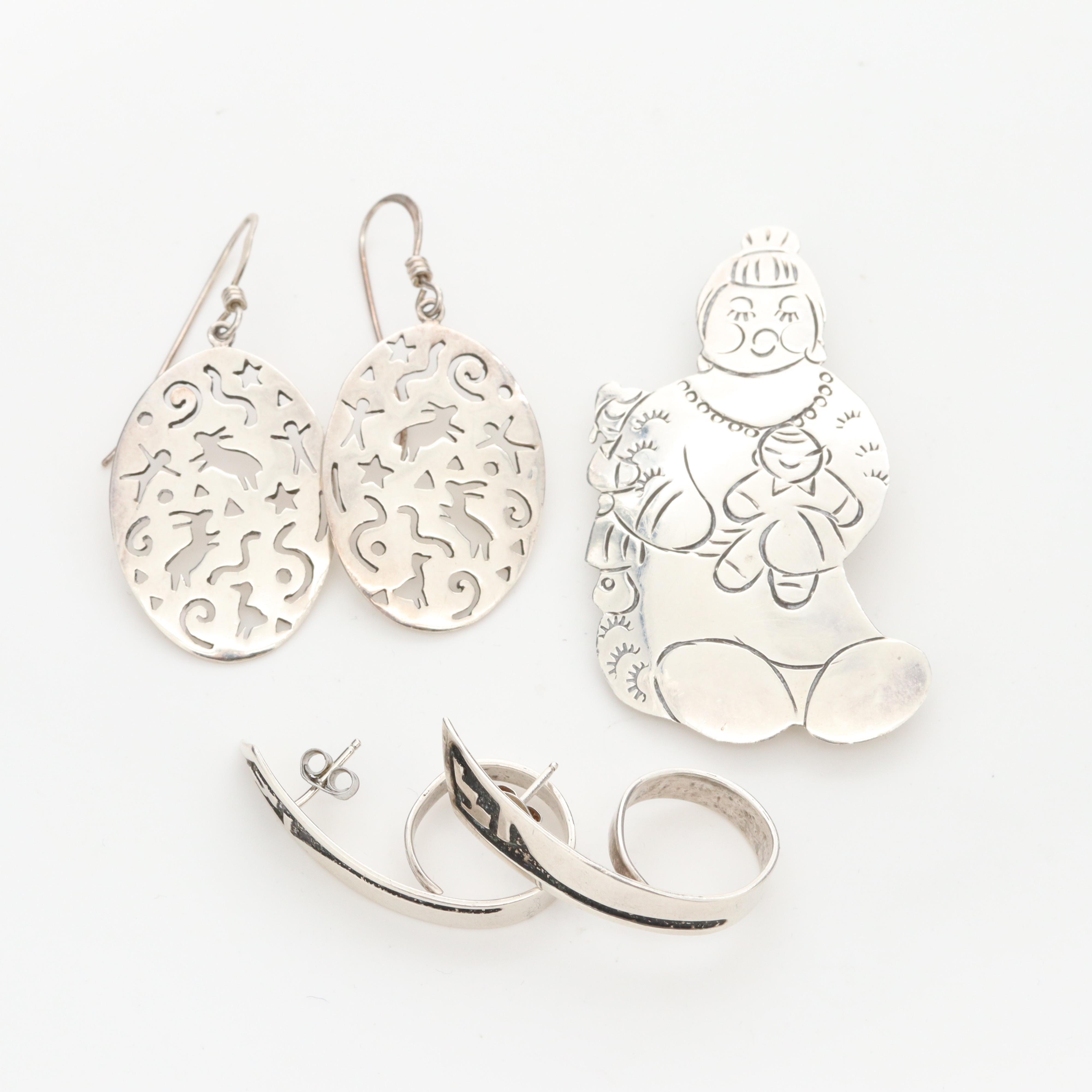 Sterling Silver Converter Brooch and Earrings Feat. L. Guerro Navajo Diné