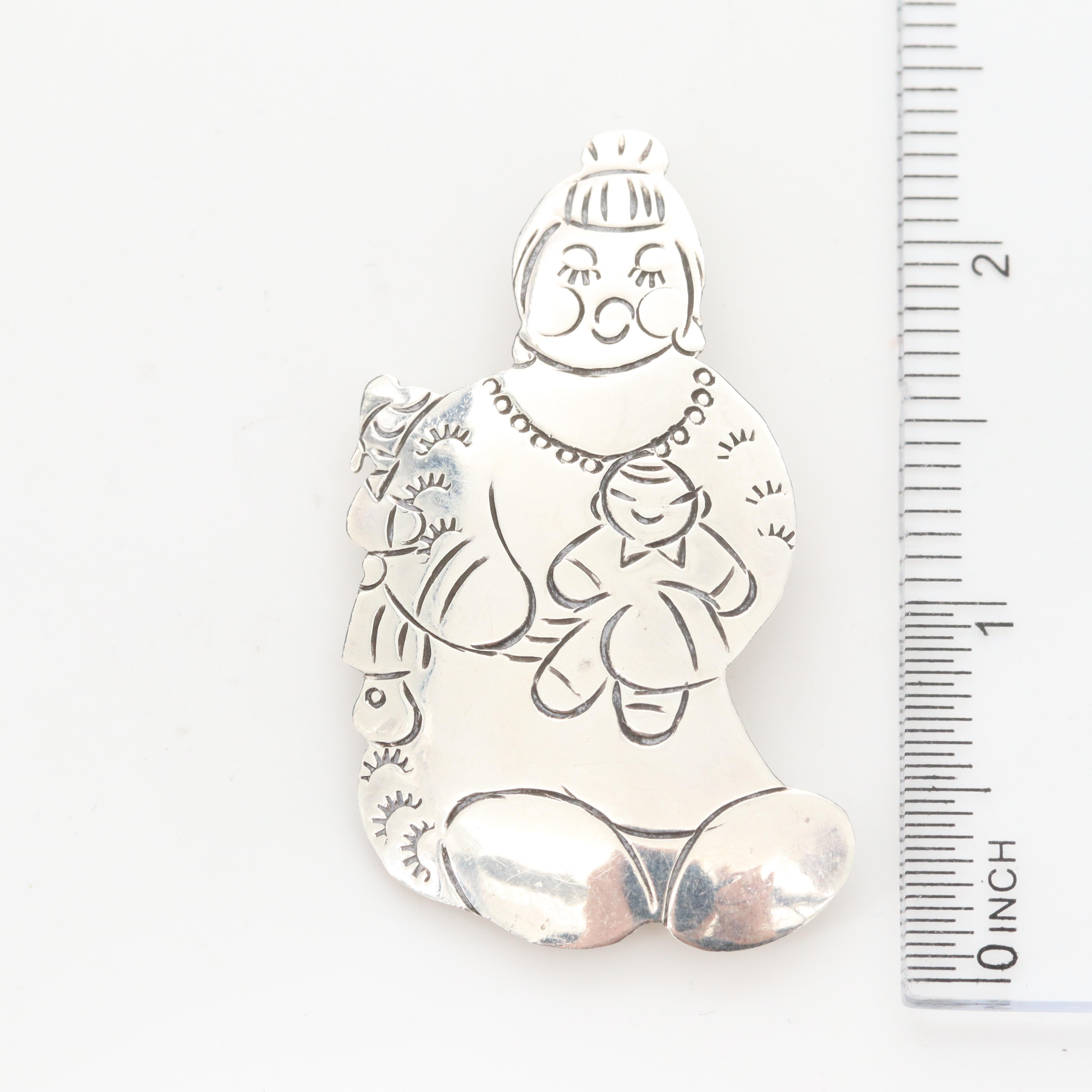 Sterling Silver Converter Brooch and Earrings Feat. L. Guerro Navajo Diné