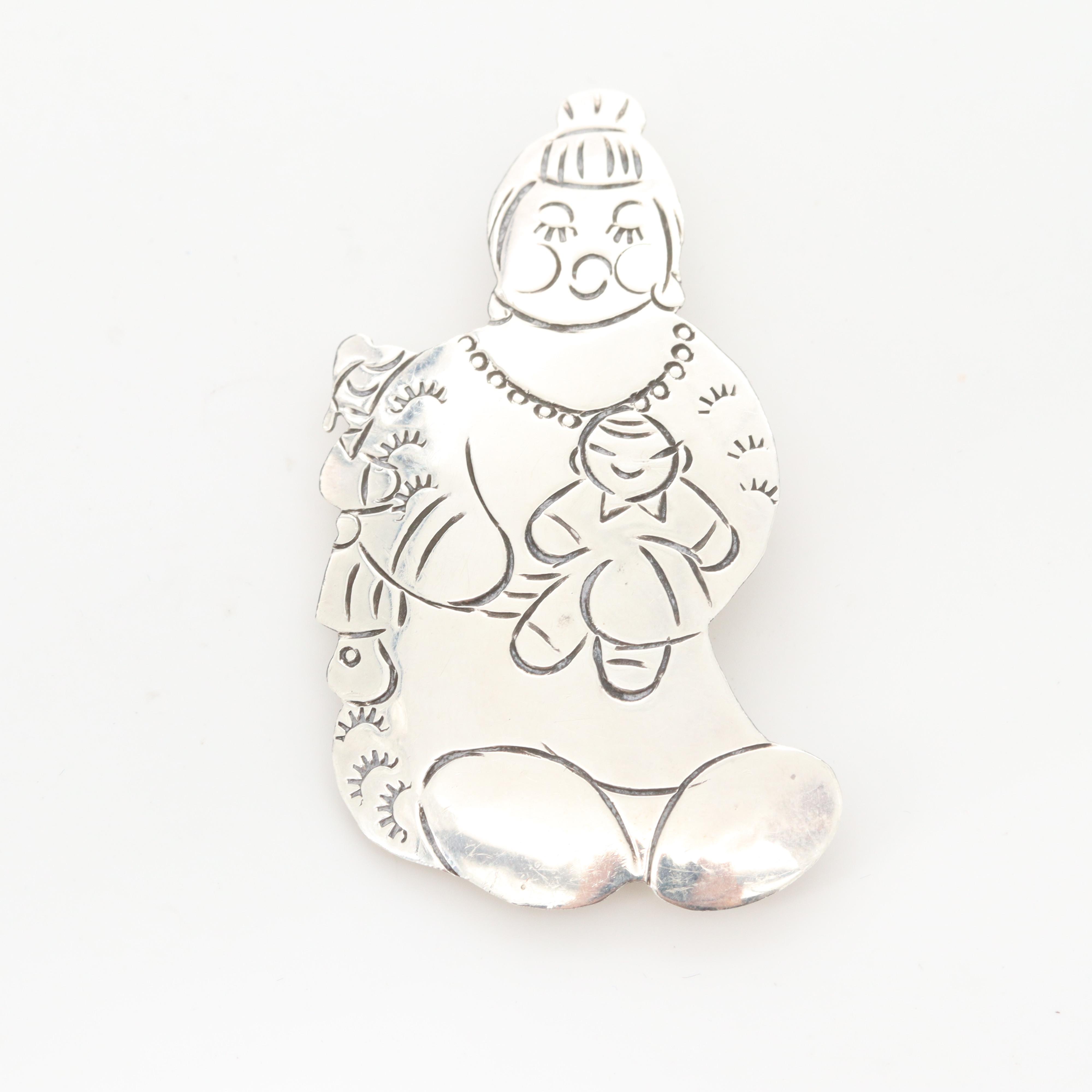 Sterling Silver Converter Brooch and Earrings Feat. L. Guerro Navajo Diné