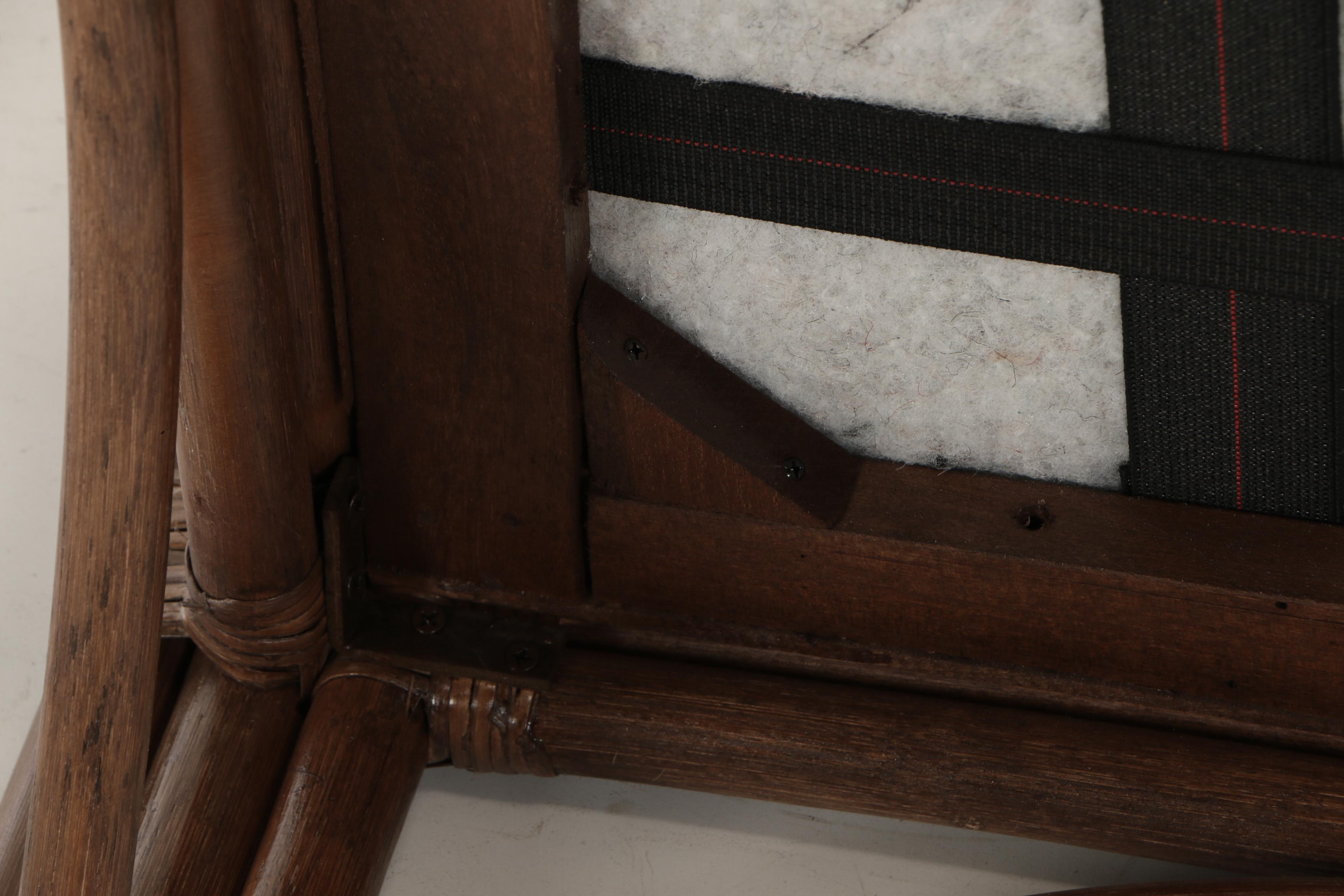 Benchcraft Furniture, Brown Rattan and Floral-Upholstered Armchair and Ottoman