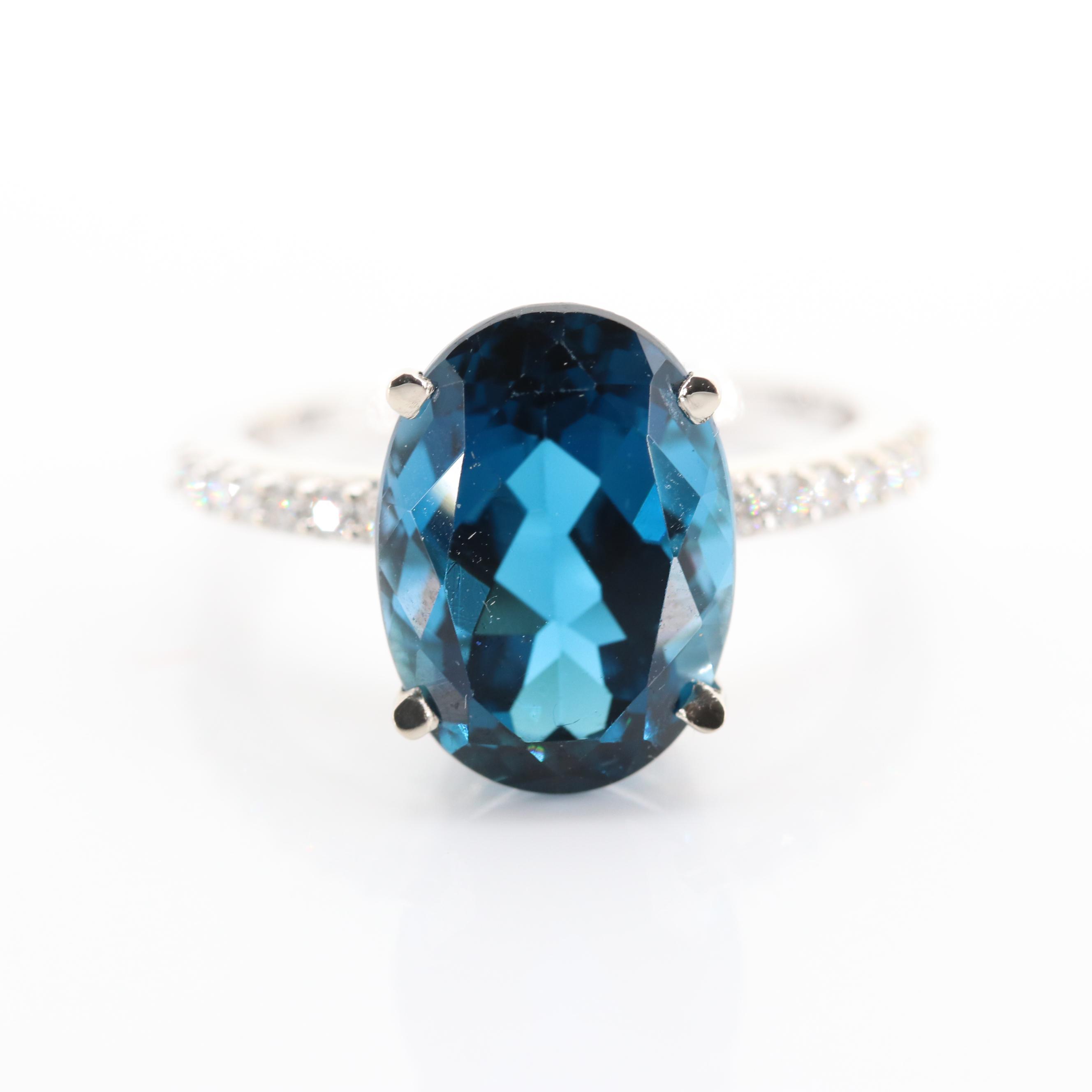 14K White Gold 7.82 CT Blue Topaz and Diamond Ring