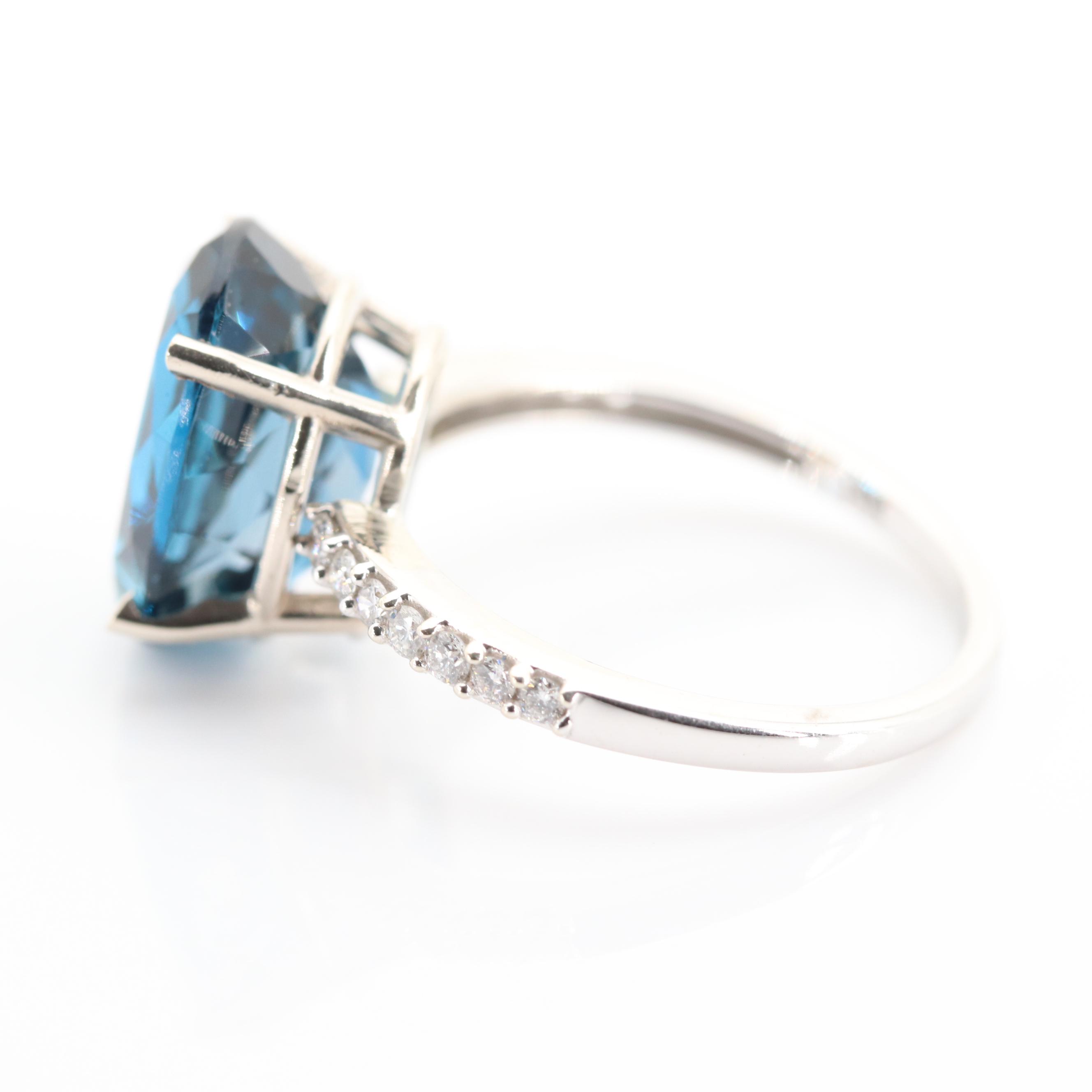 14K White Gold 7.82 CT Blue Topaz and Diamond Ring