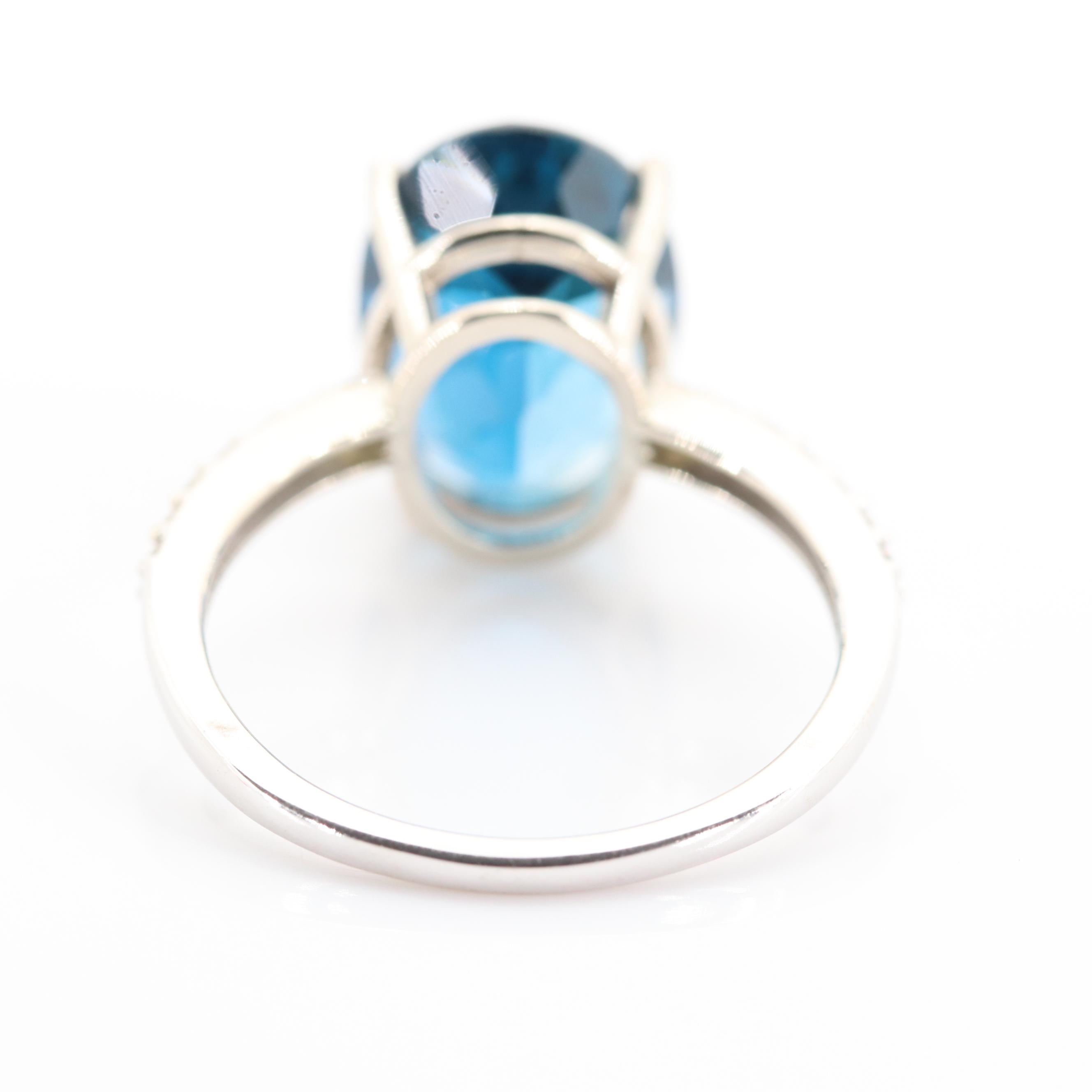 14K White Gold 7.82 CT Blue Topaz and Diamond Ring