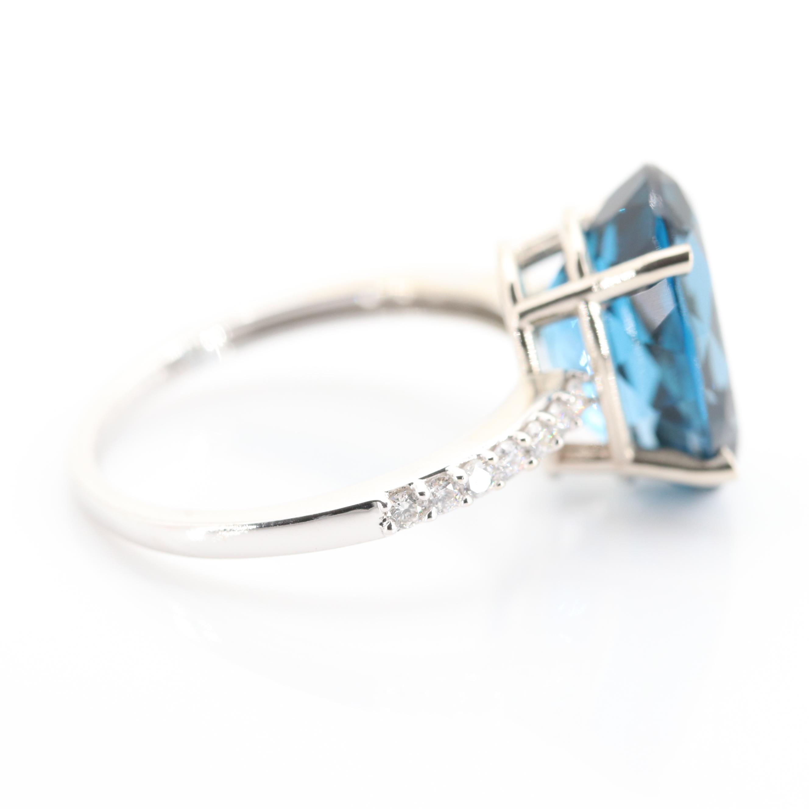 14K White Gold 7.82 CT Blue Topaz and Diamond Ring