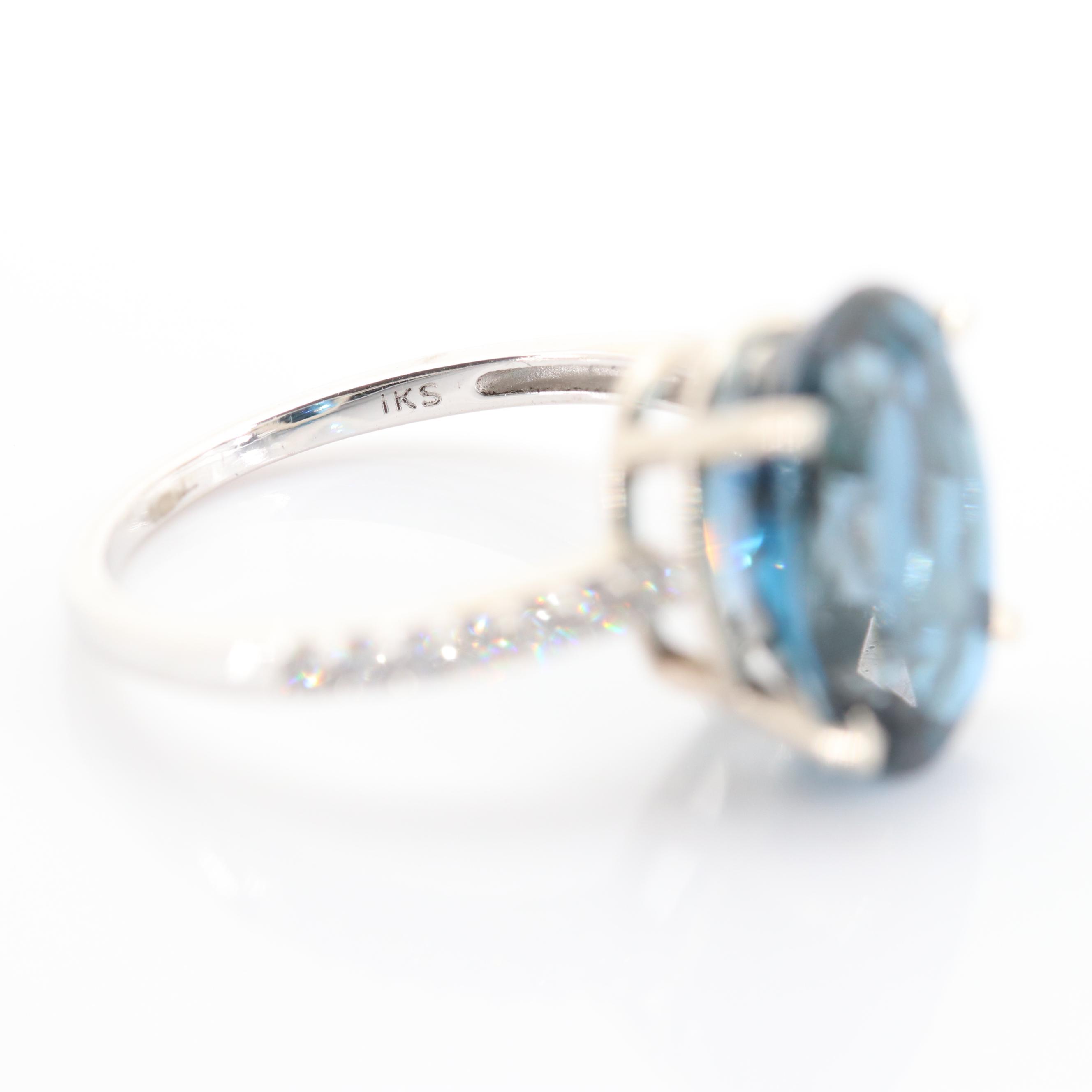 14K White Gold 7.82 CT Blue Topaz and Diamond Ring