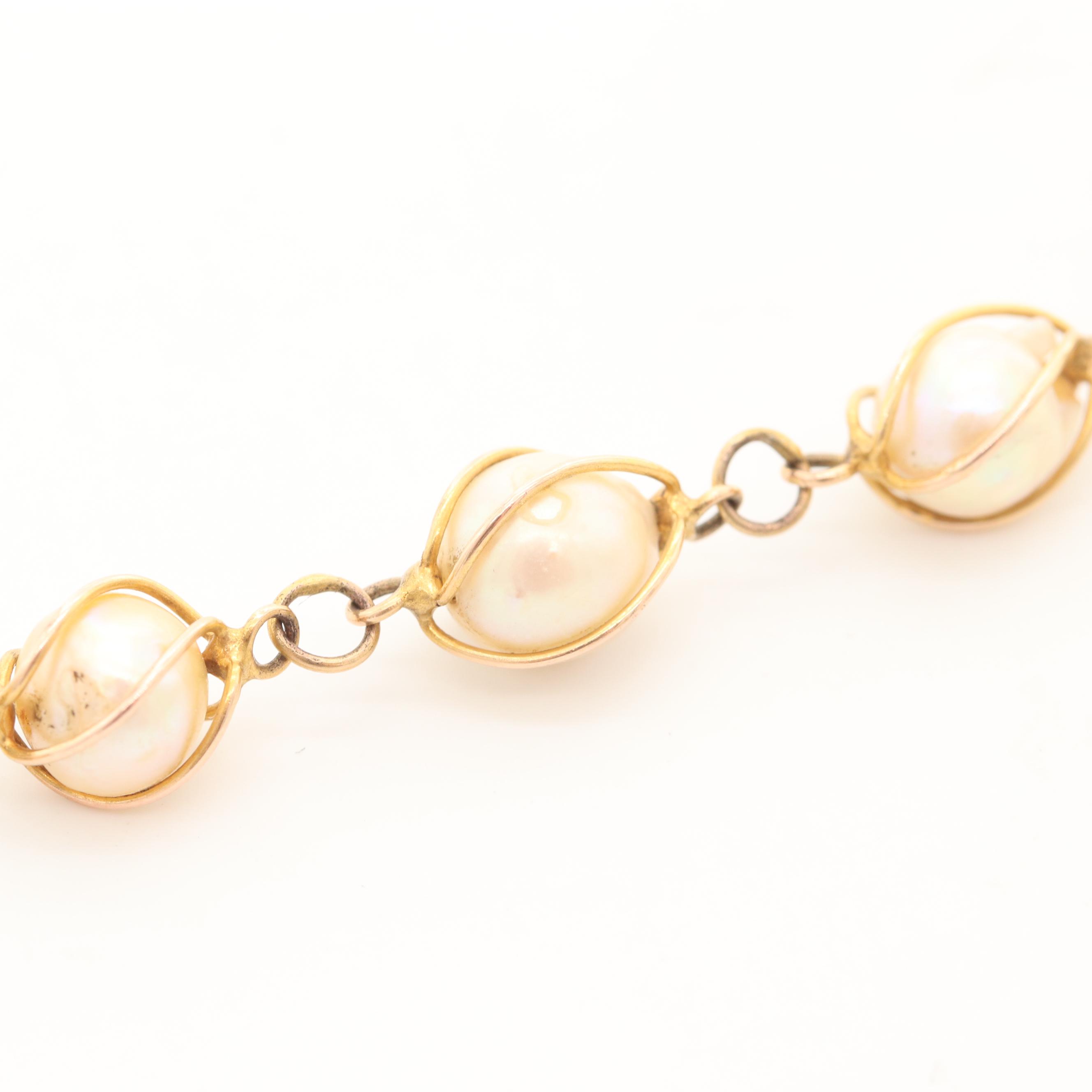 14K Yellow Gold Cultured Pearl Bracelet with 18K Yellow Gold Basket Charm