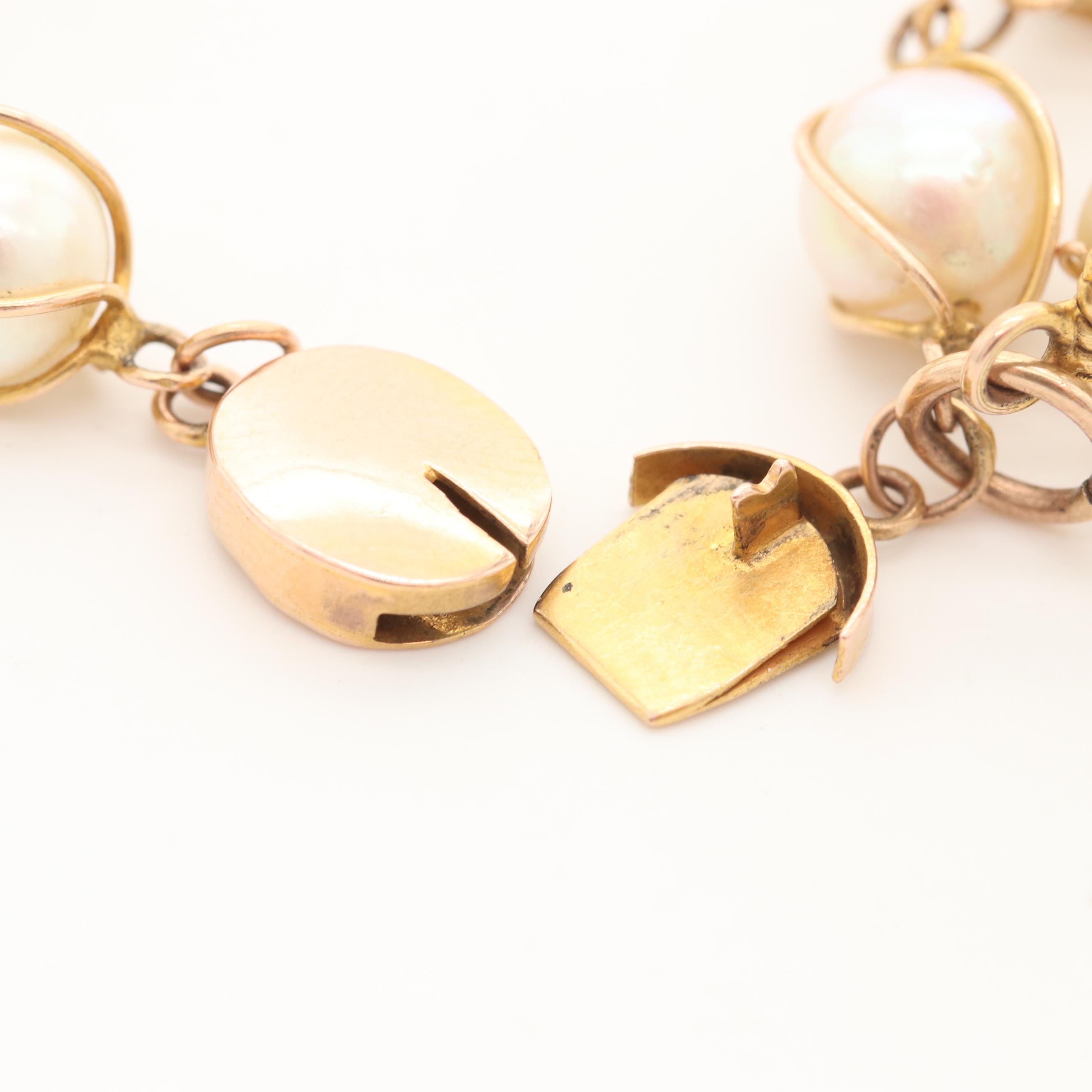 14K Yellow Gold Cultured Pearl Bracelet with 18K Yellow Gold Basket Charm