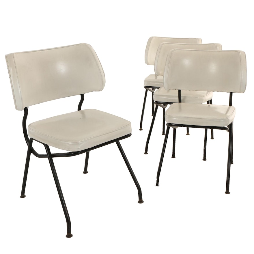 Four Mid Century Modern White Naugahyde and Ebonized Tubular Steel Side Chairs