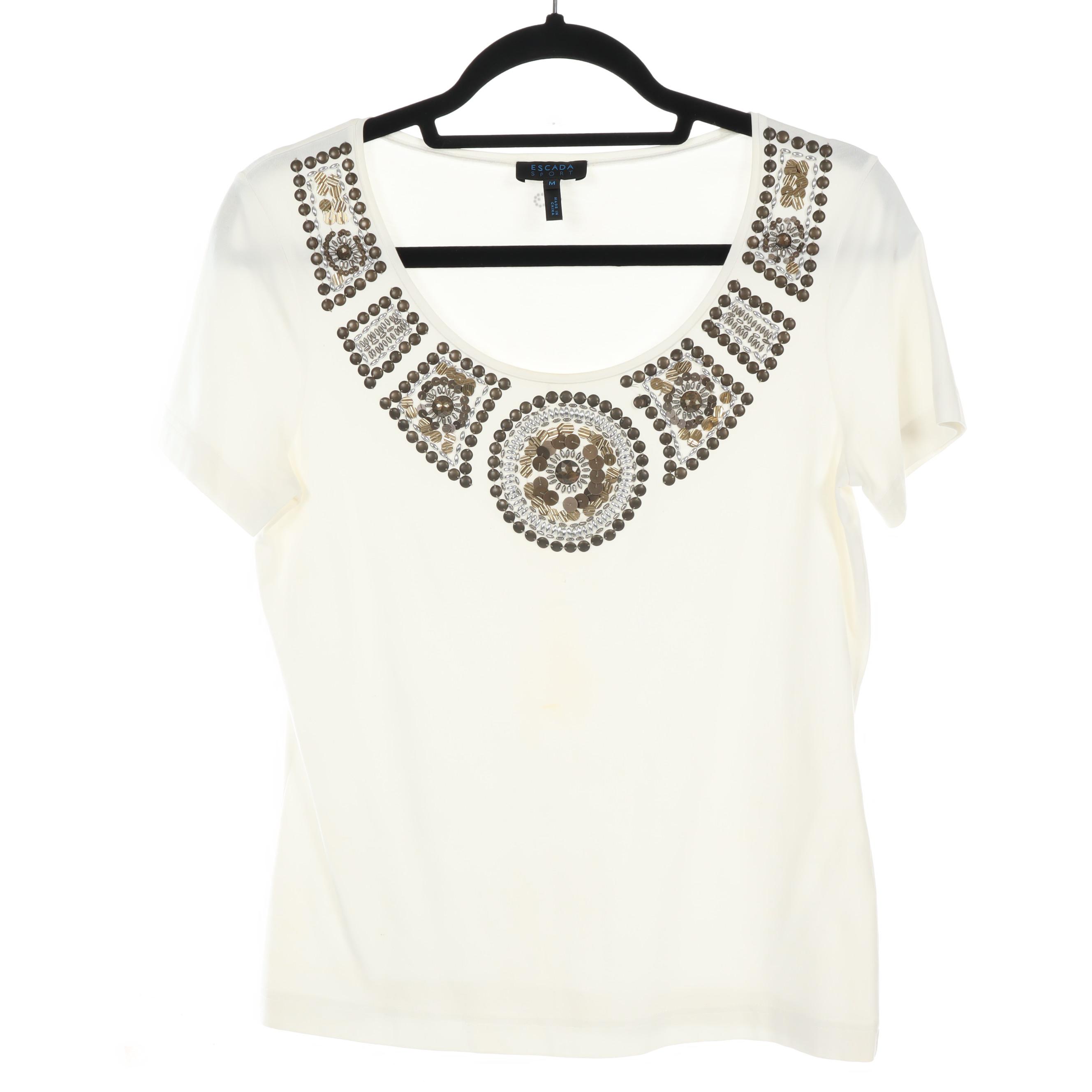 St John, Escada, and Tory Burch and Emanuel Ungaro Separates