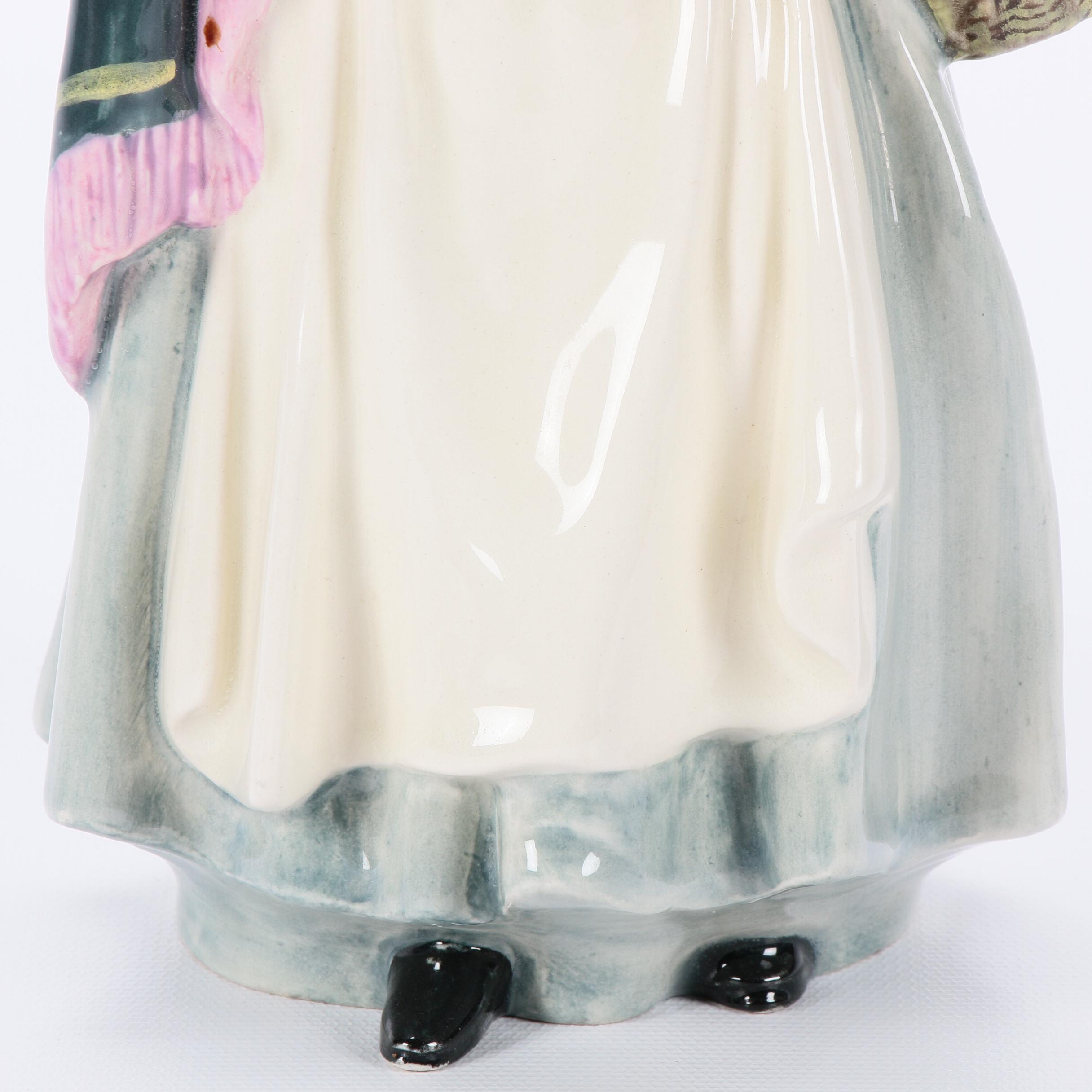 Royal Doulton "The Balloon Man" and "Biddy Pennyfarthing" Porcelain Figurines