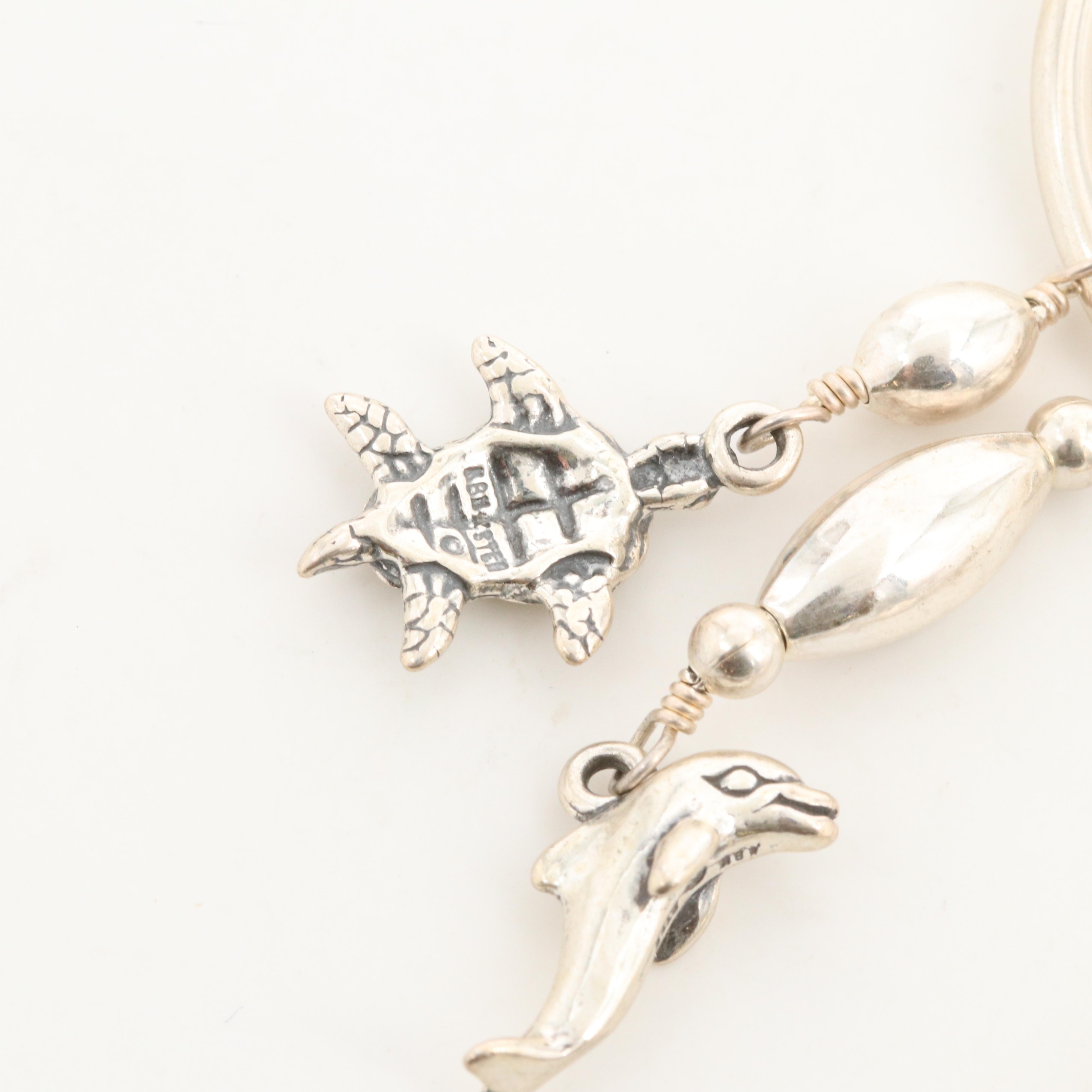 Kabana Sterling Silver Hoop Earrings with Dolphin and Turtle Dangles