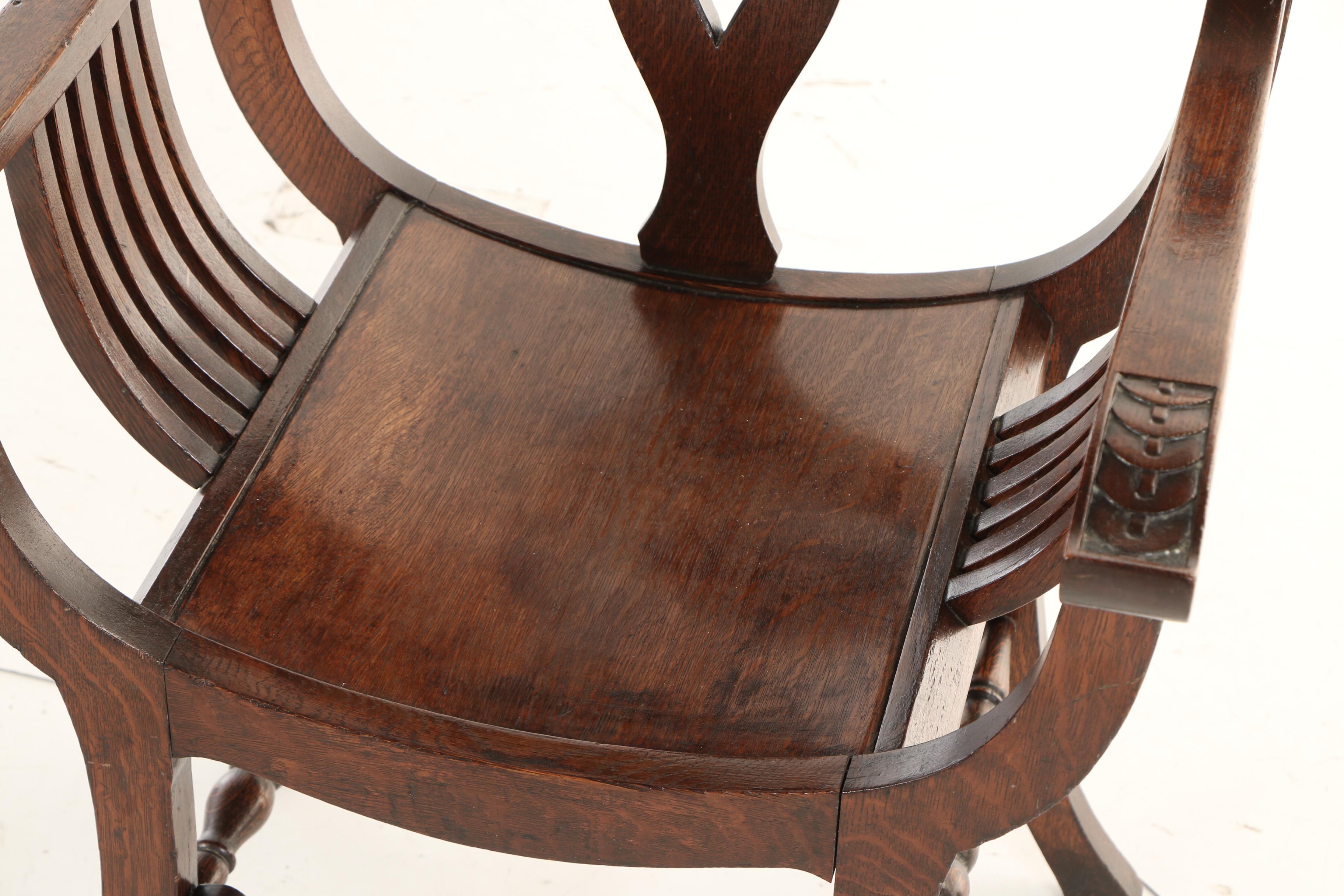 The Stomps Burkhardt Co., Late Victorian Carved Oak Savonarola Chair