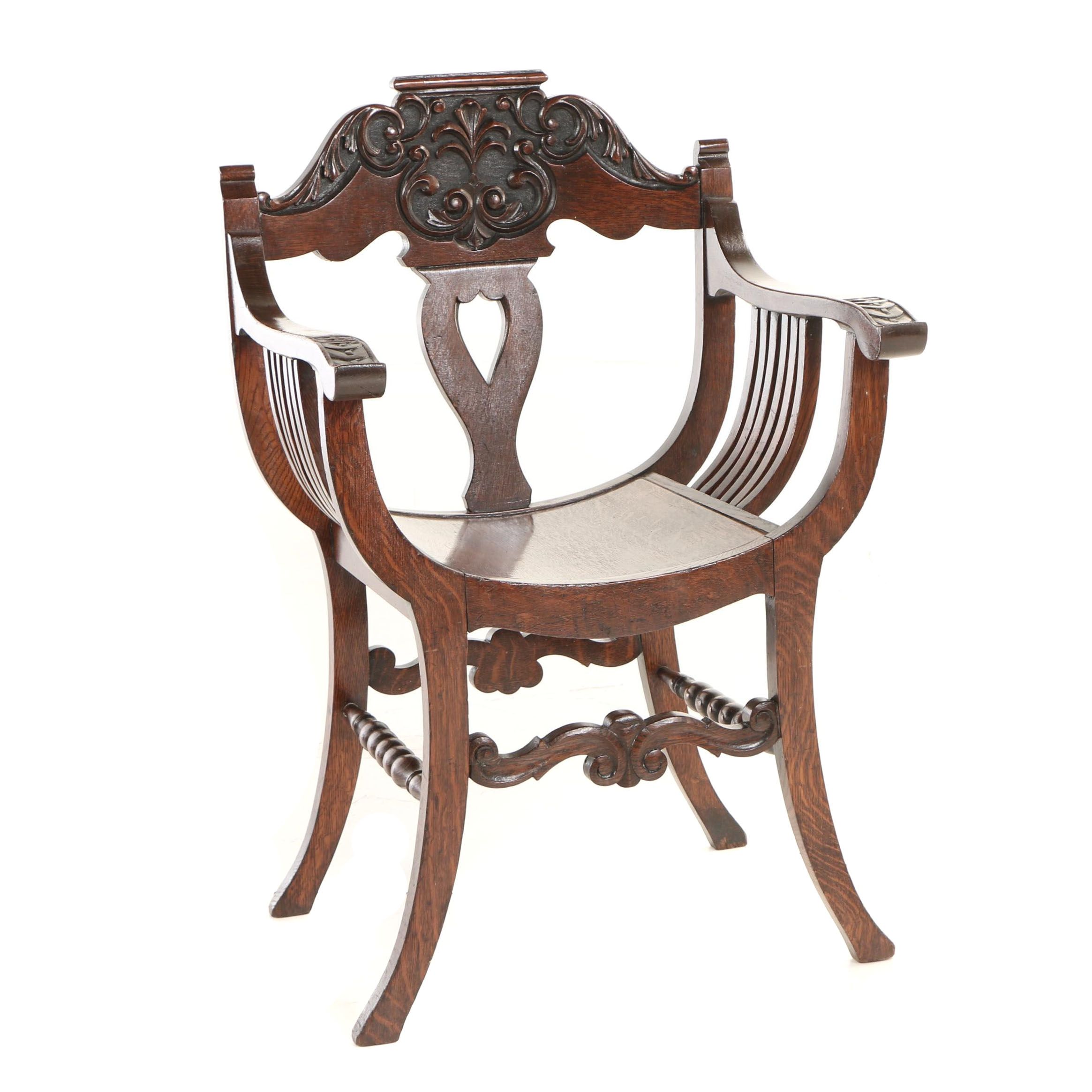 The Stomps Burkhardt Co., Late Victorian Carved Oak Savonarola Chair