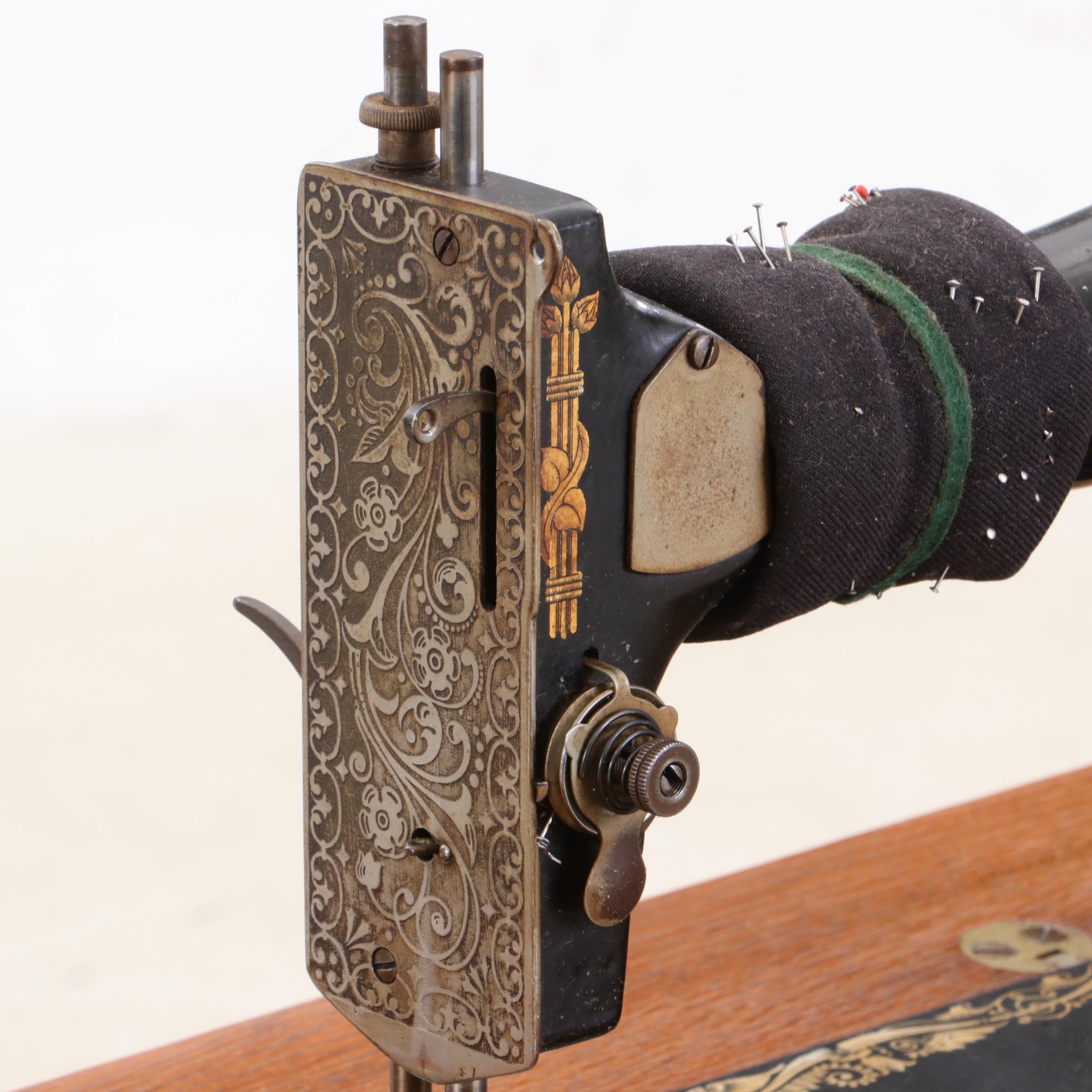 Oak Singer Sewing Machine and Sewing Accessories, Patented 1891