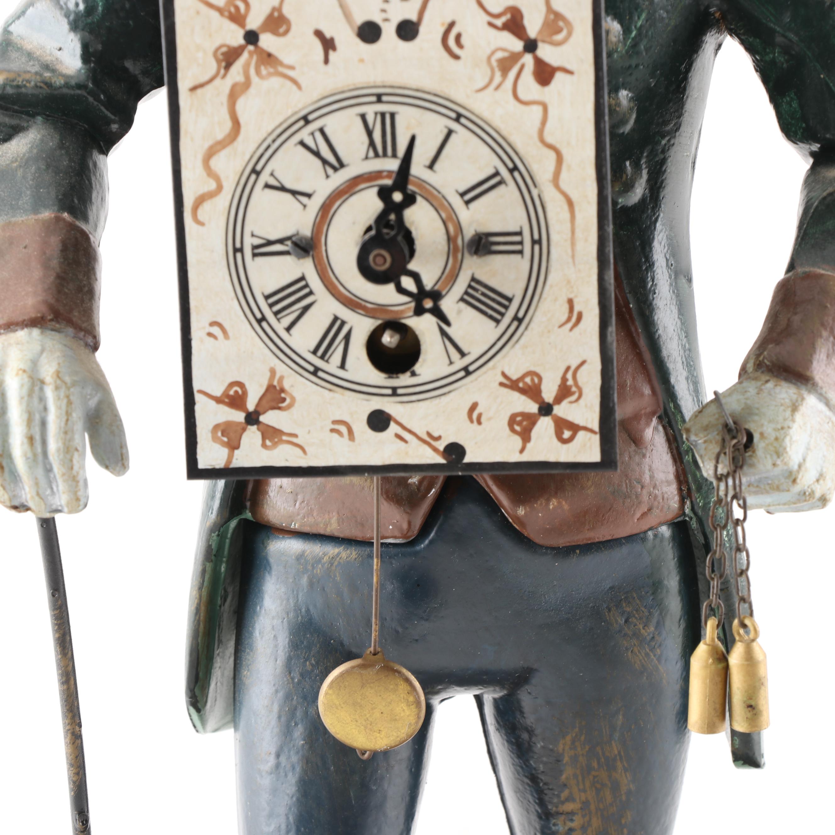 J.v.E. Cast Metal Dutch Clock Peddler Figural Clock, Early to Mid 20th Century