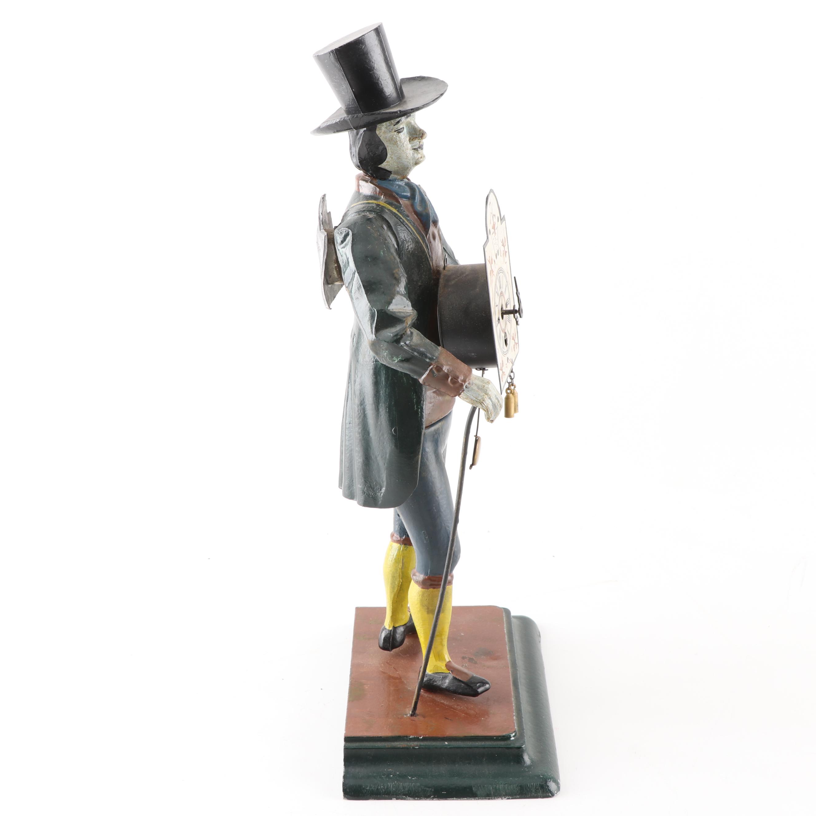 J.v.E. Cast Metal Dutch Clock Peddler Figural Clock, Early to Mid 20th Century