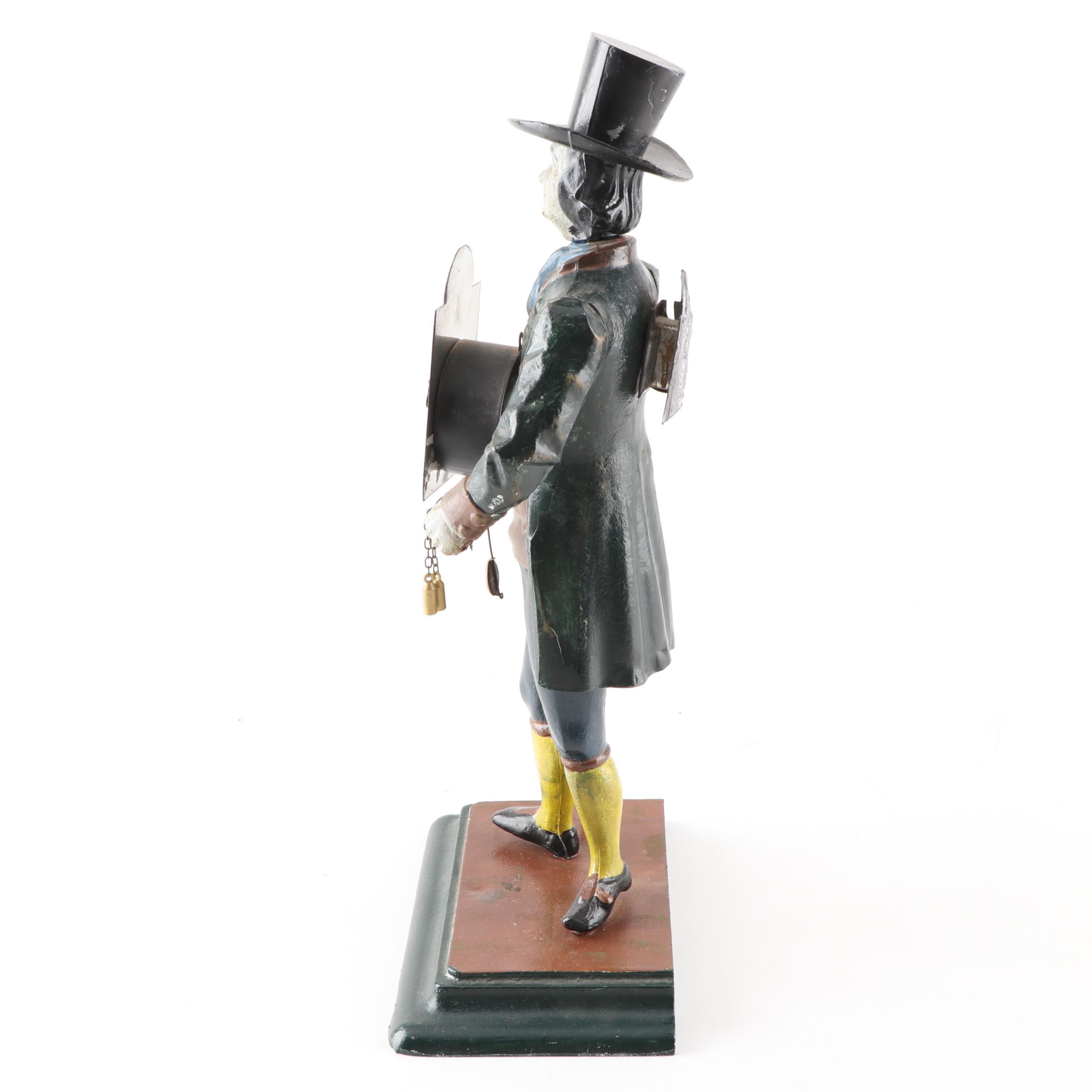 J.v.E. Cast Metal Dutch Clock Peddler Figural Clock, Early to Mid 20th Century