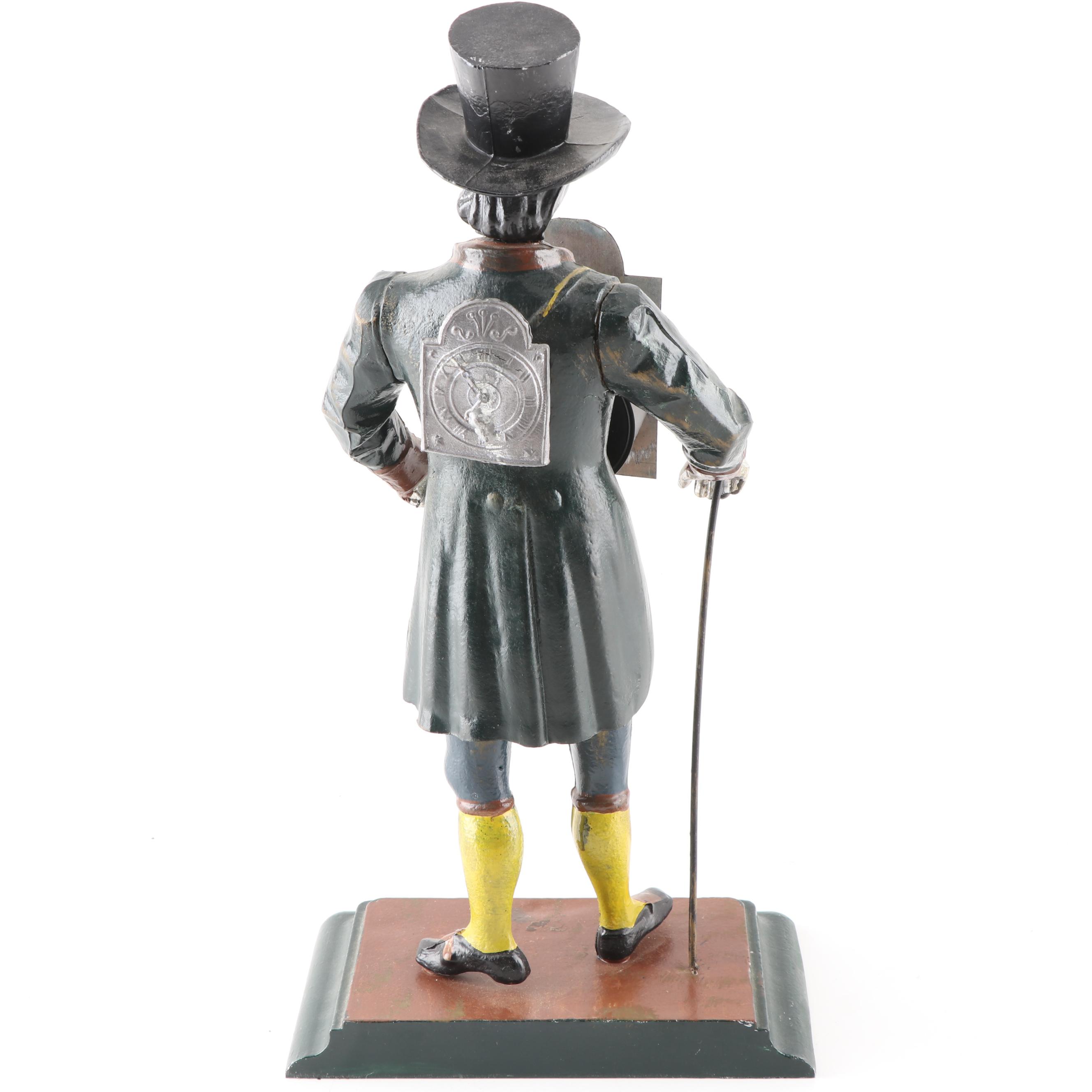 J.v.E. Cast Metal Dutch Clock Peddler Figural Clock, Early to Mid 20th Century