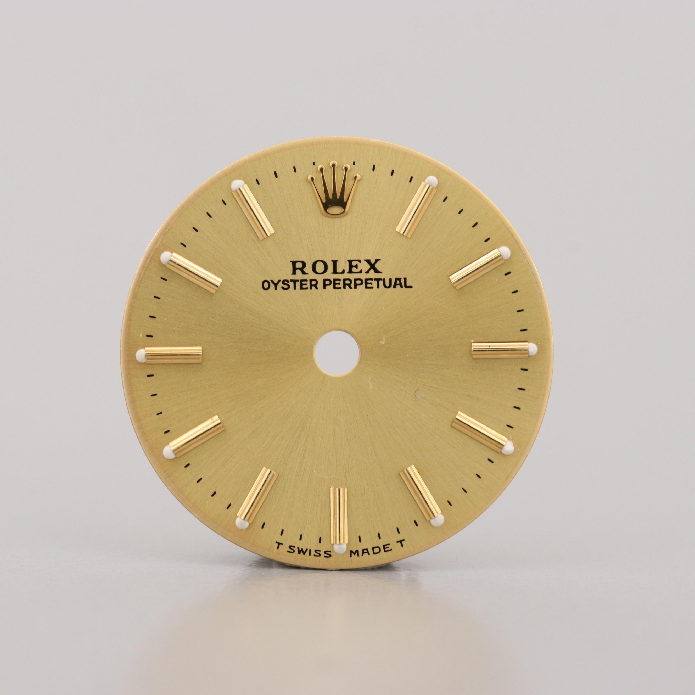 Rolex Oyster Perpetual Dial and 14K Yellow Gold Fluted Bezel