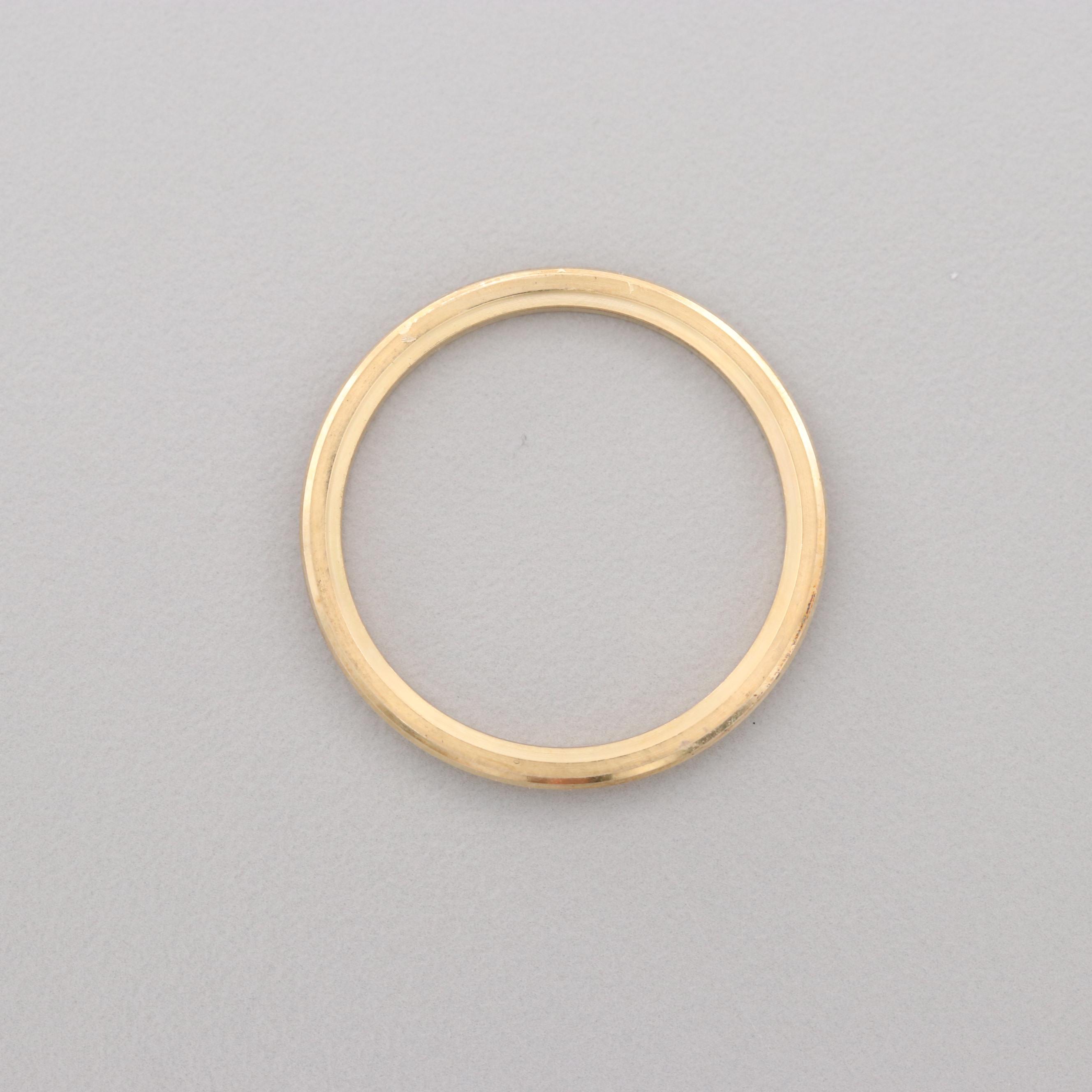 Rolex Oyster Perpetual Dial and 14K Yellow Gold Fluted Bezel