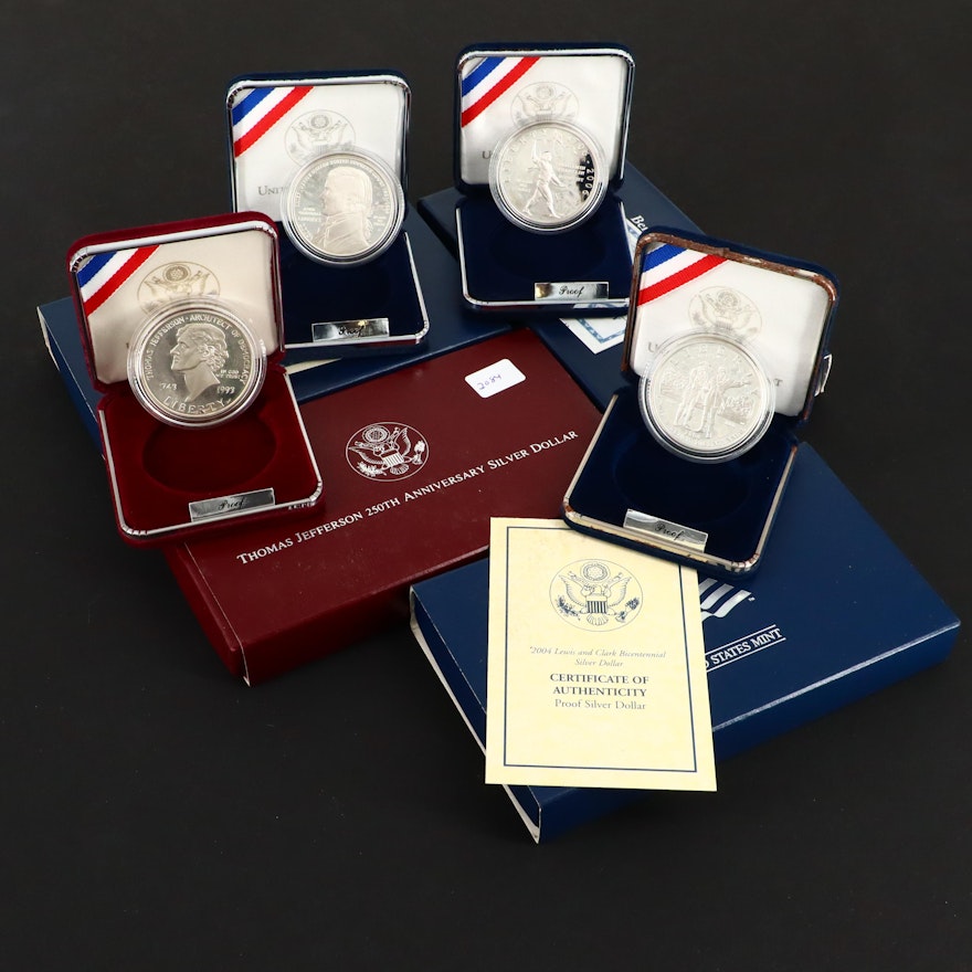 Four U.S. Commemorative Proof Silver Dollars