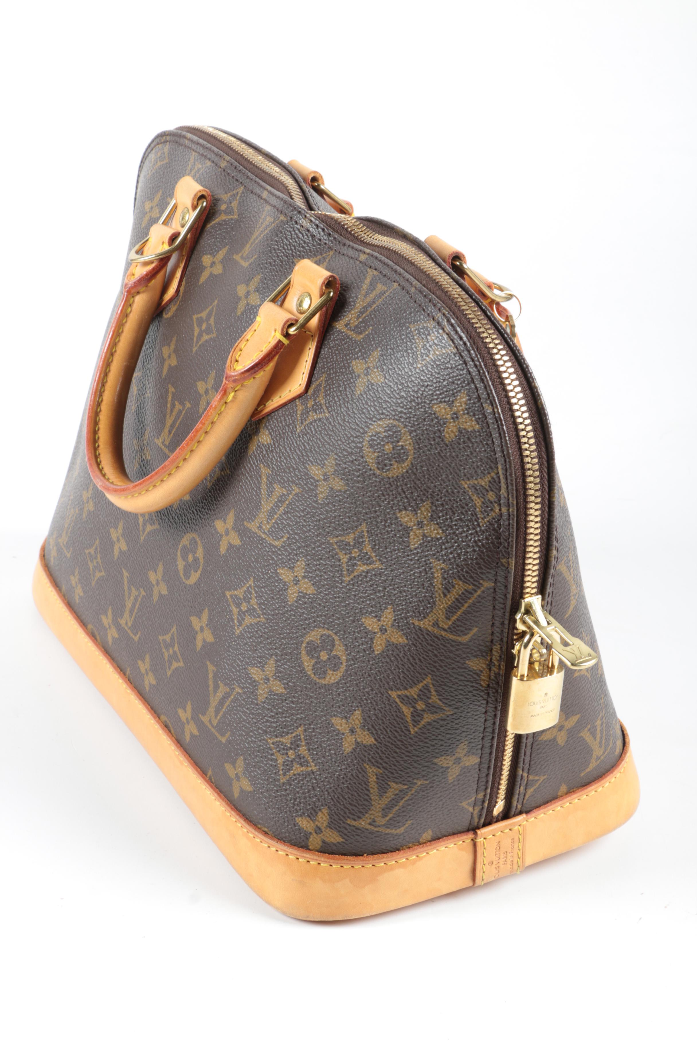 Louis Vuitton Paris Alma PM Bag in Monogram Canvas and Leather