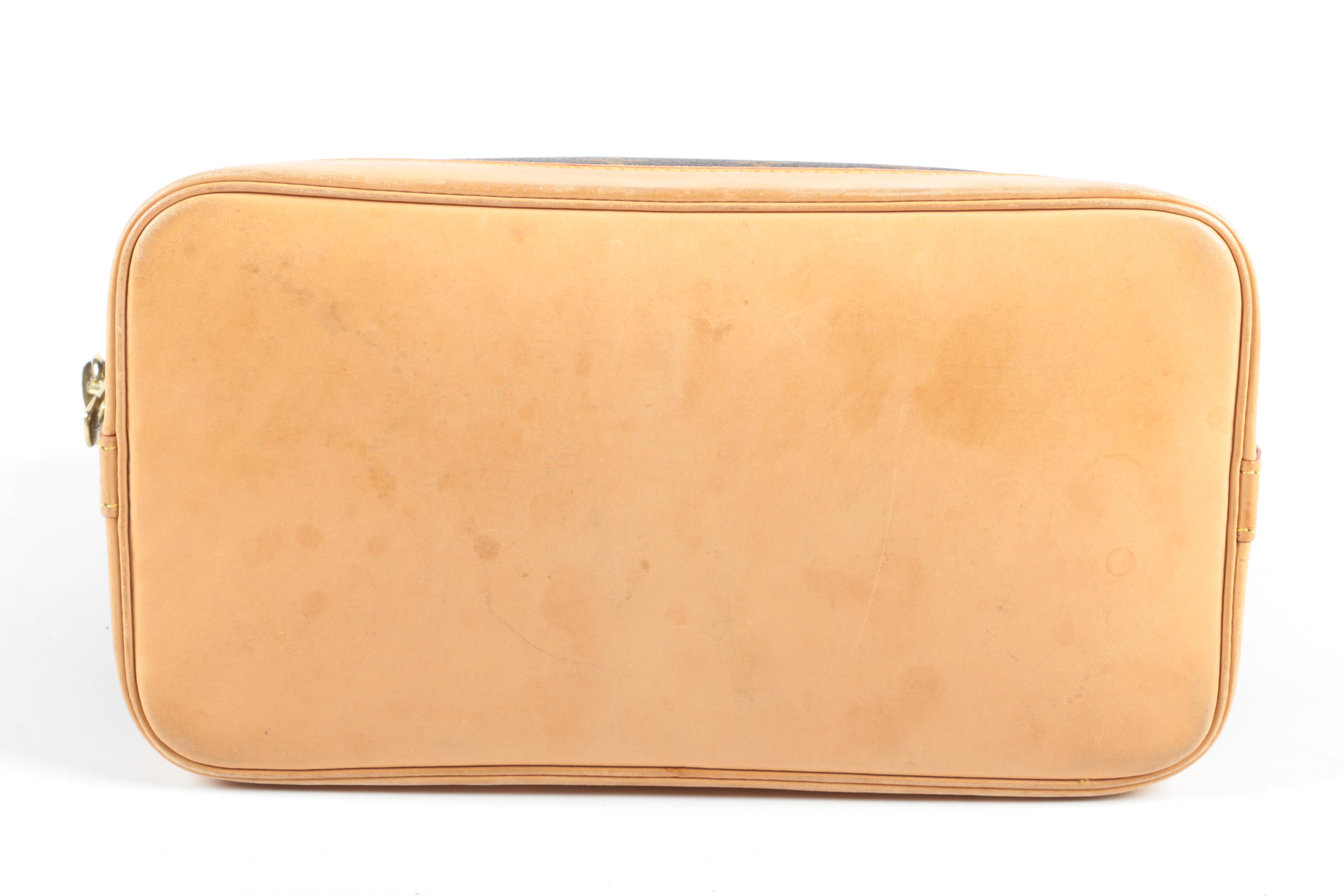 Louis Vuitton Paris Alma PM Bag in Monogram Canvas and Leather