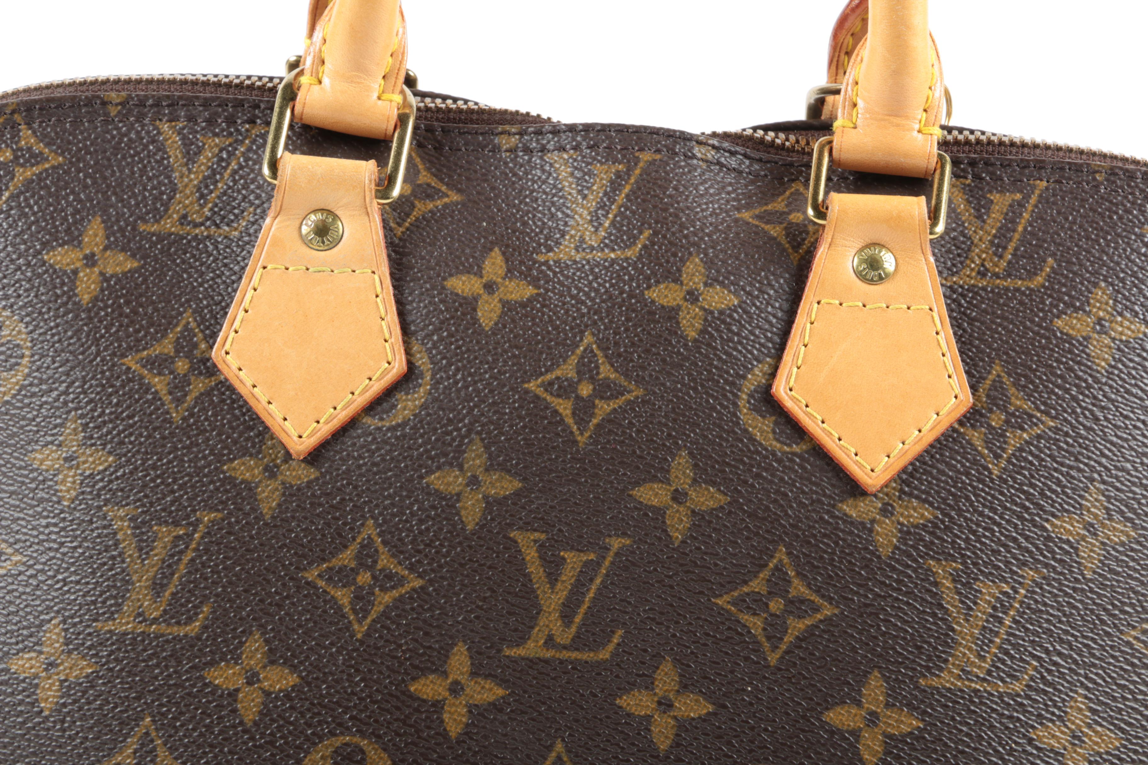 Louis Vuitton Paris Alma PM Bag in Monogram Canvas and Leather