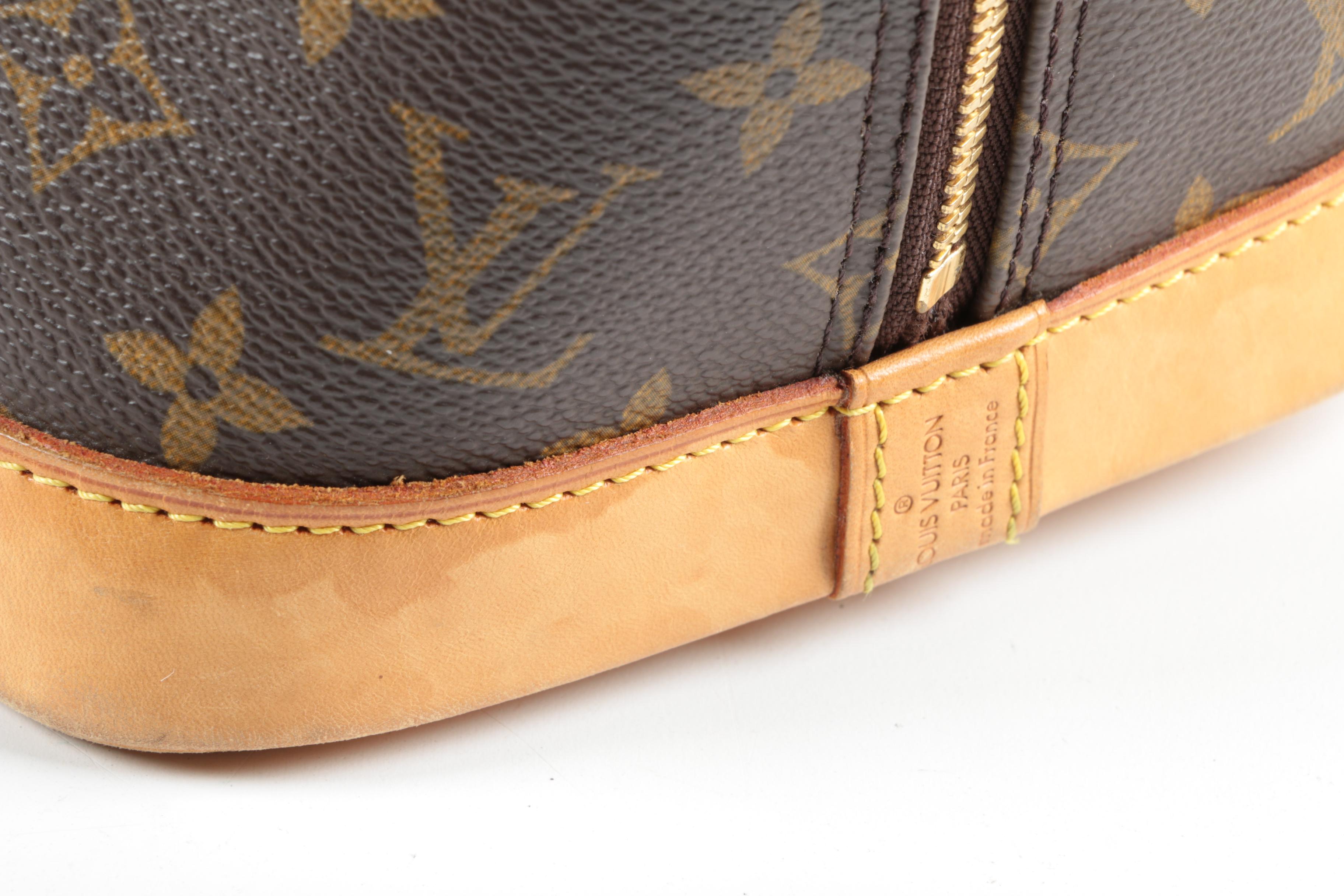 Louis Vuitton Paris Alma PM Bag in Monogram Canvas and Leather