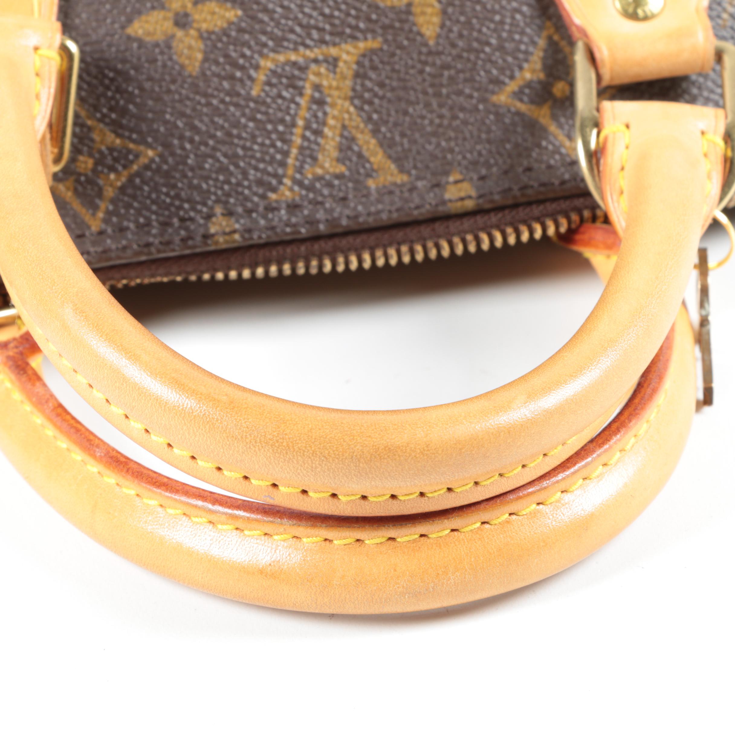 Louis Vuitton Paris Alma PM Bag in Monogram Canvas and Leather