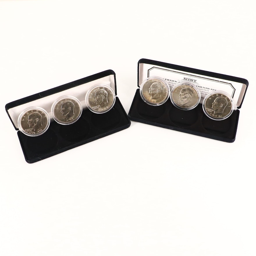 Two Three-Coin Sets of Uncirculated Eisenhower Dollars