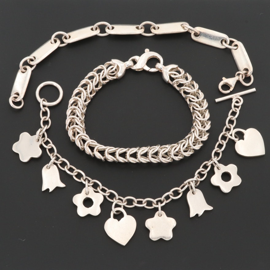 Sterling Silver Bracelets Including a Charm Bracelet