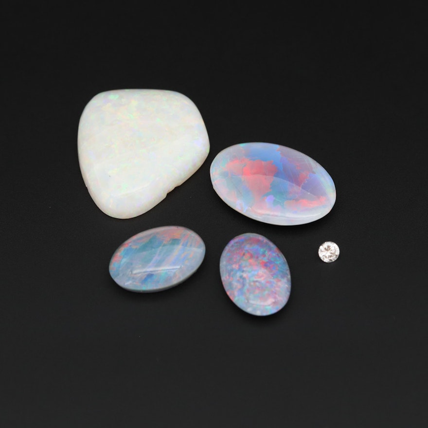Loose 17.79 CTW Gemstone Assortment Including Opal and Colorless Sapphire
