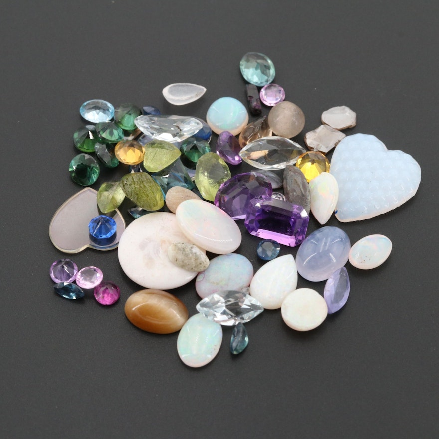 Loose 20.89 CTW Gemstone Assortment Including Opal and Peridot