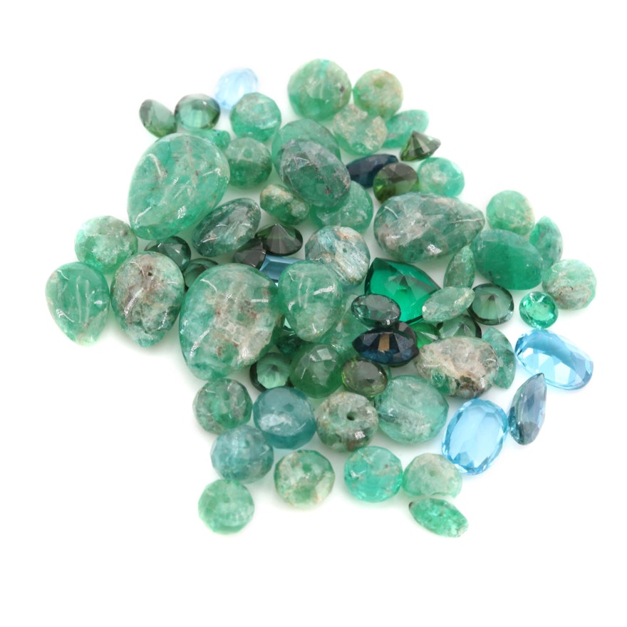 Loose 28.18 CTW Gemstone Assortment Including Emerald and Blue Sapphire